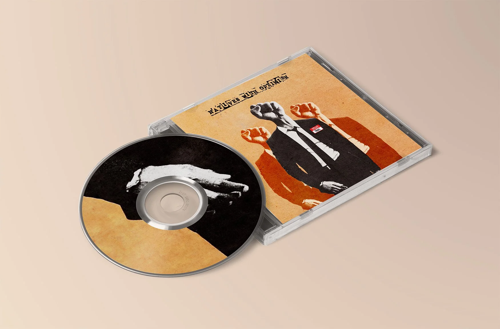 An audio CD with black and orange abstract artwork and a cover featuring a stylized person with raised fists, wearing a suit, against a tan background.