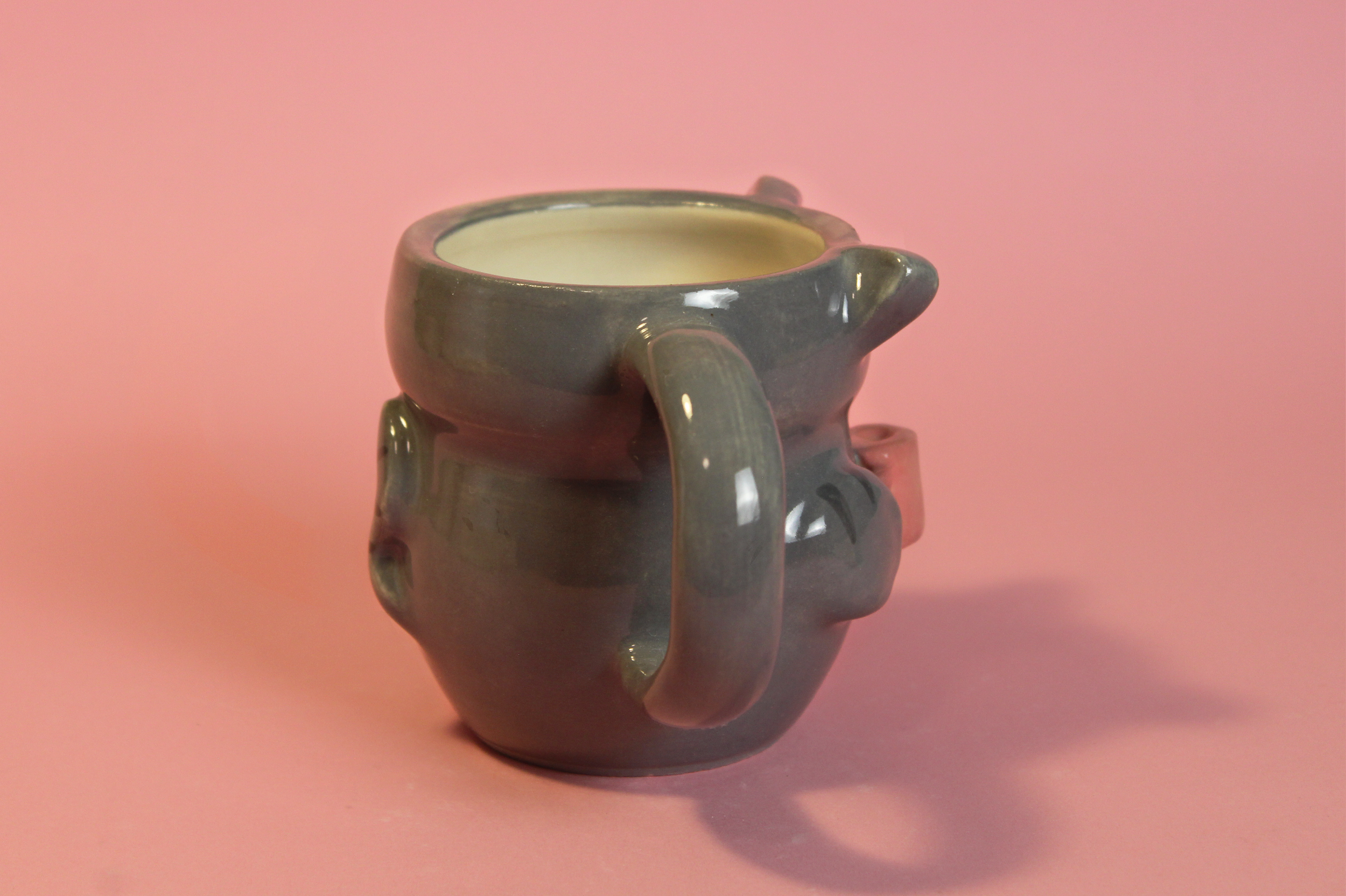 Gray cat mug side.png