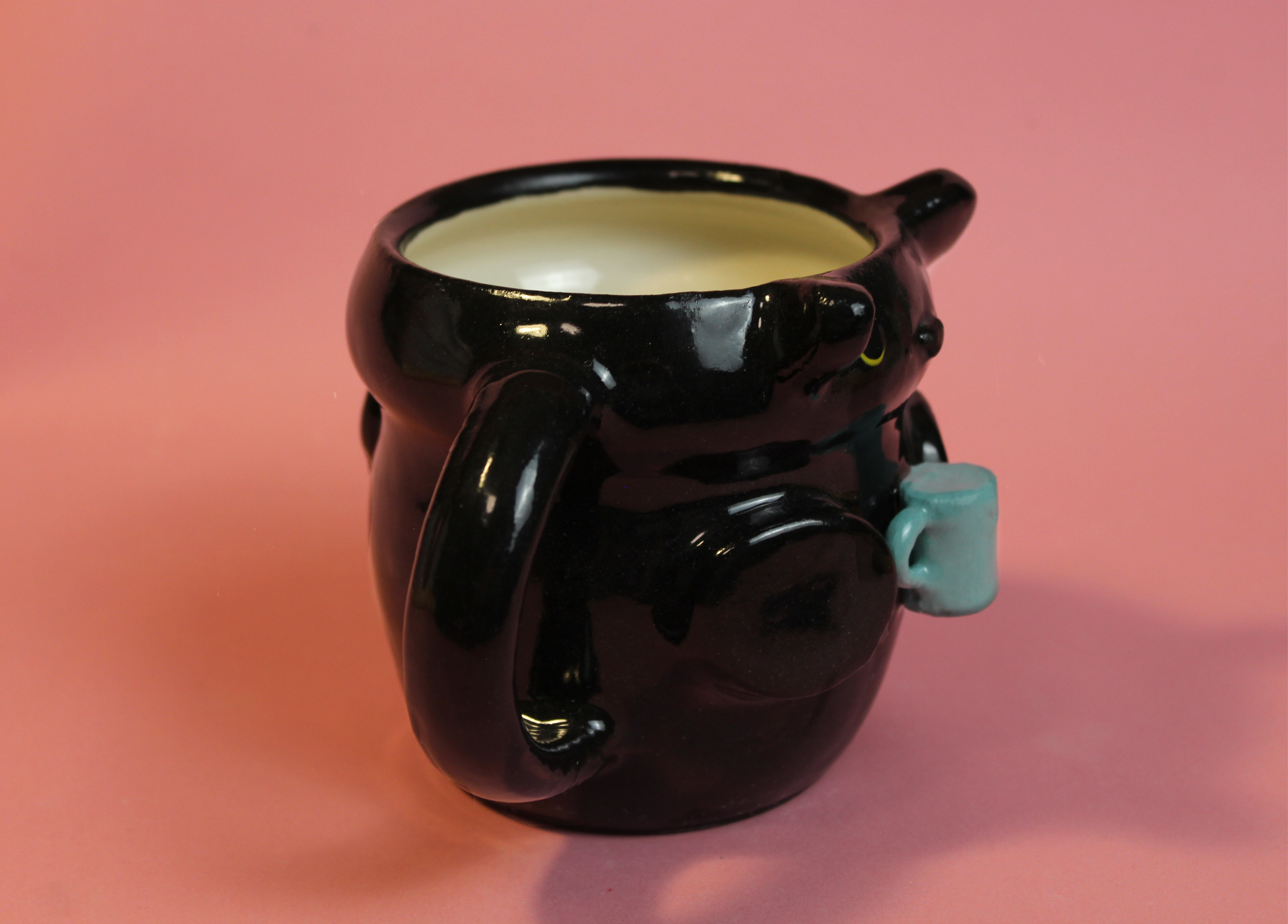 black cat mug side.png