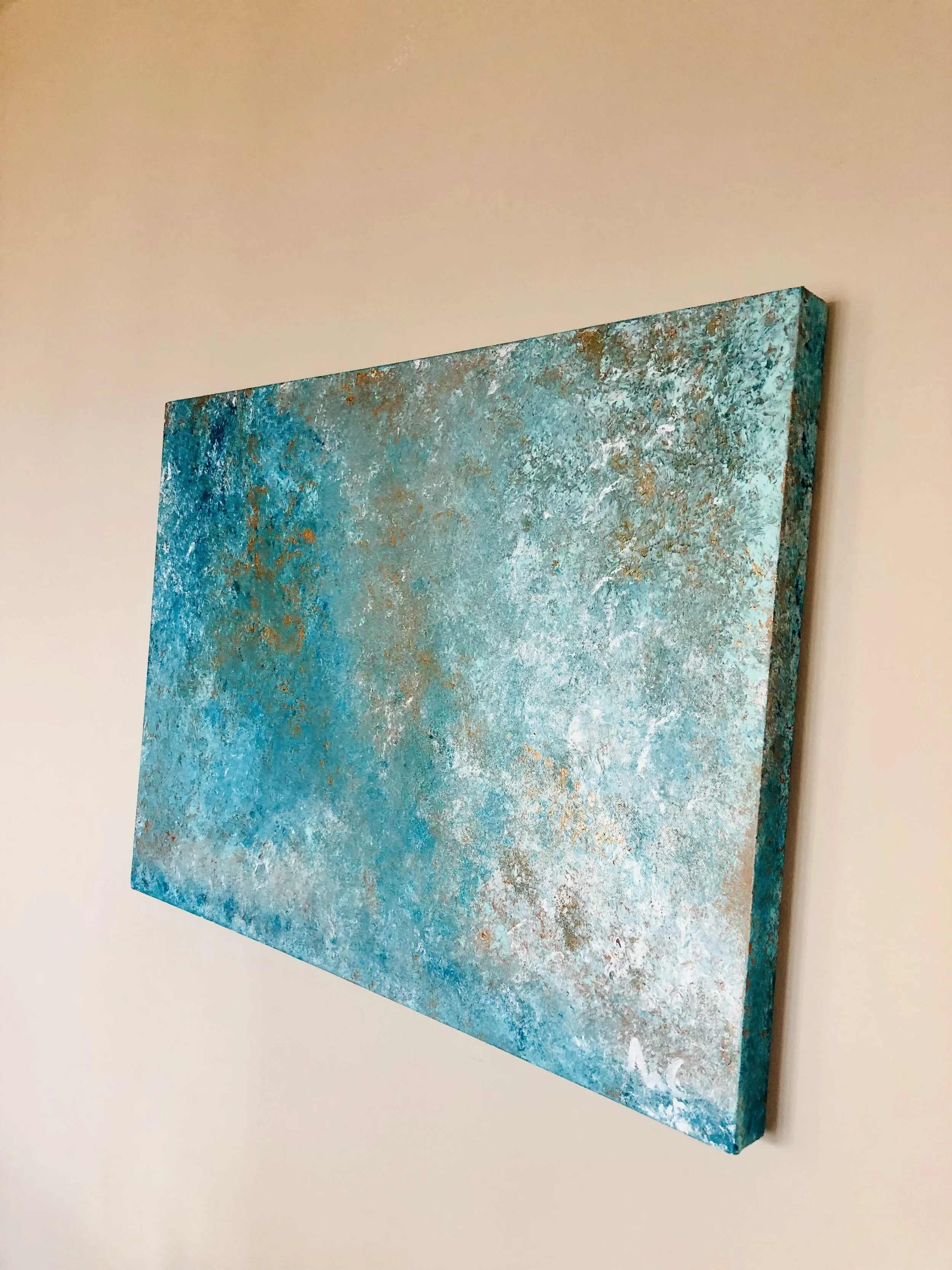 Abstract painting with shades of blue and textured surface