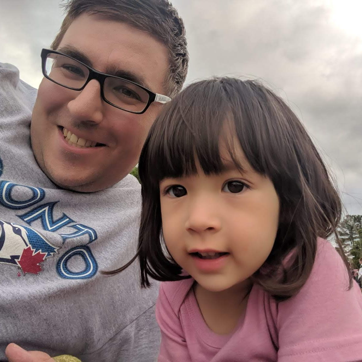 Trevor and Amelia waiting for a show to start at the park.