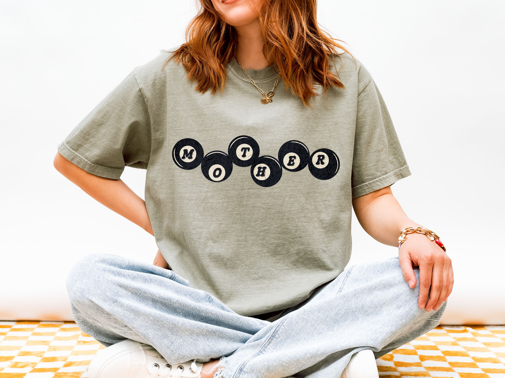 Motherhood Is a Gamble Graphic Tee