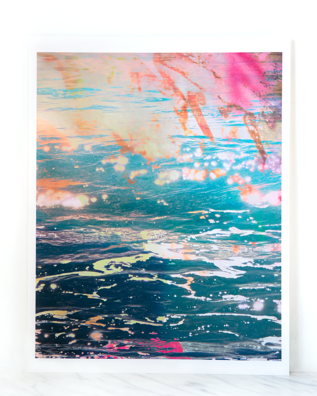 Flow Like Water — an abstract fine art print by Faith-Ann Young, merging ocean textures with vibrant turquoise, indigo, and pink reflections, evoking flow, release, and emotional movement.