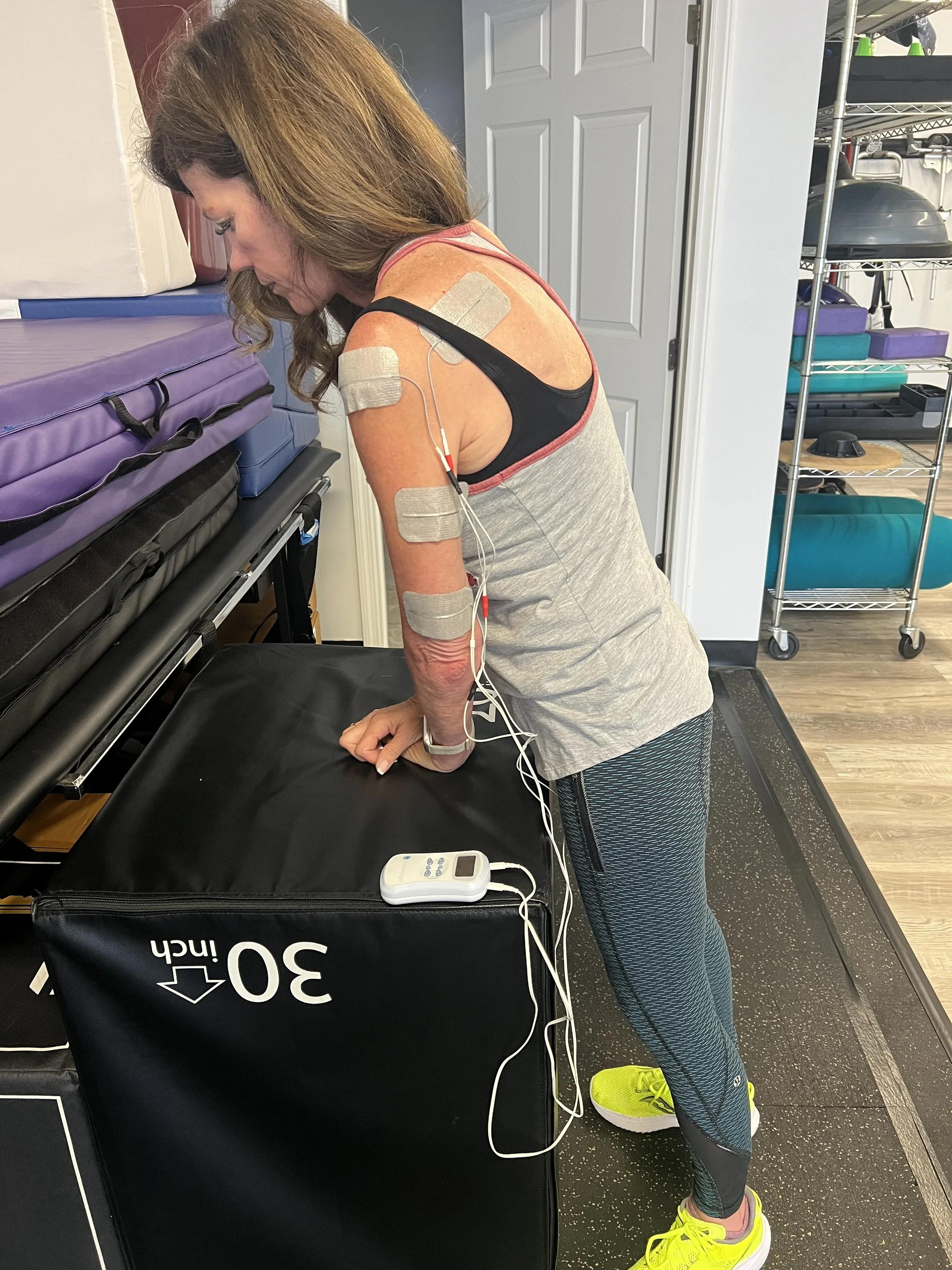 Patient working with a provider at a neurological physical therapy clinic in Charlotte, NC