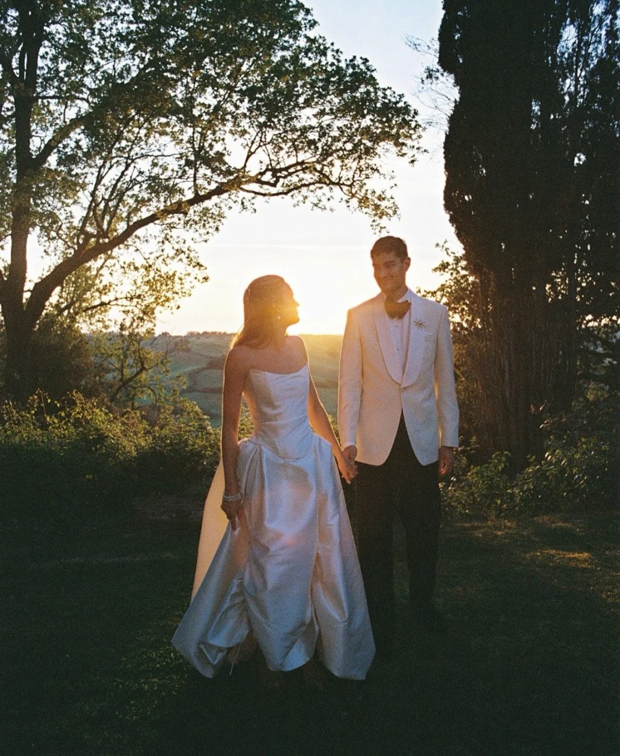 Moments lost in love, captured on film 🕊️ 

Captured beautifully by @alexandra.dogar 
WP @sienaeglantine 
Venue @borgolaticastelli 
Florals @fedefloraldesign 
Lights @afpluxurywedding