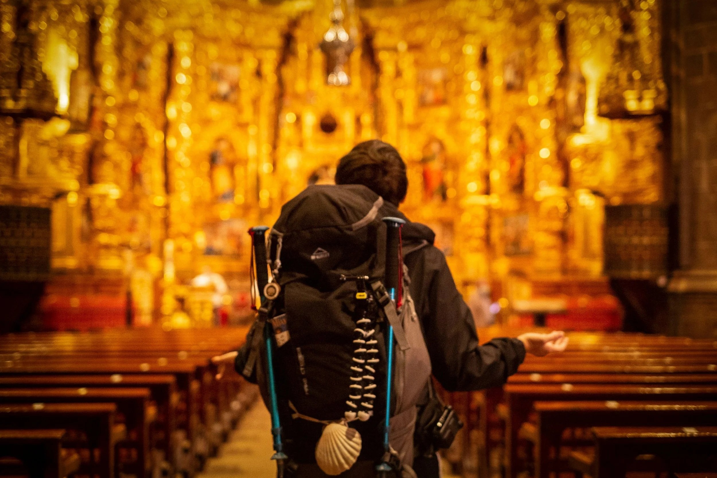 Traveler standing in European Cathedral