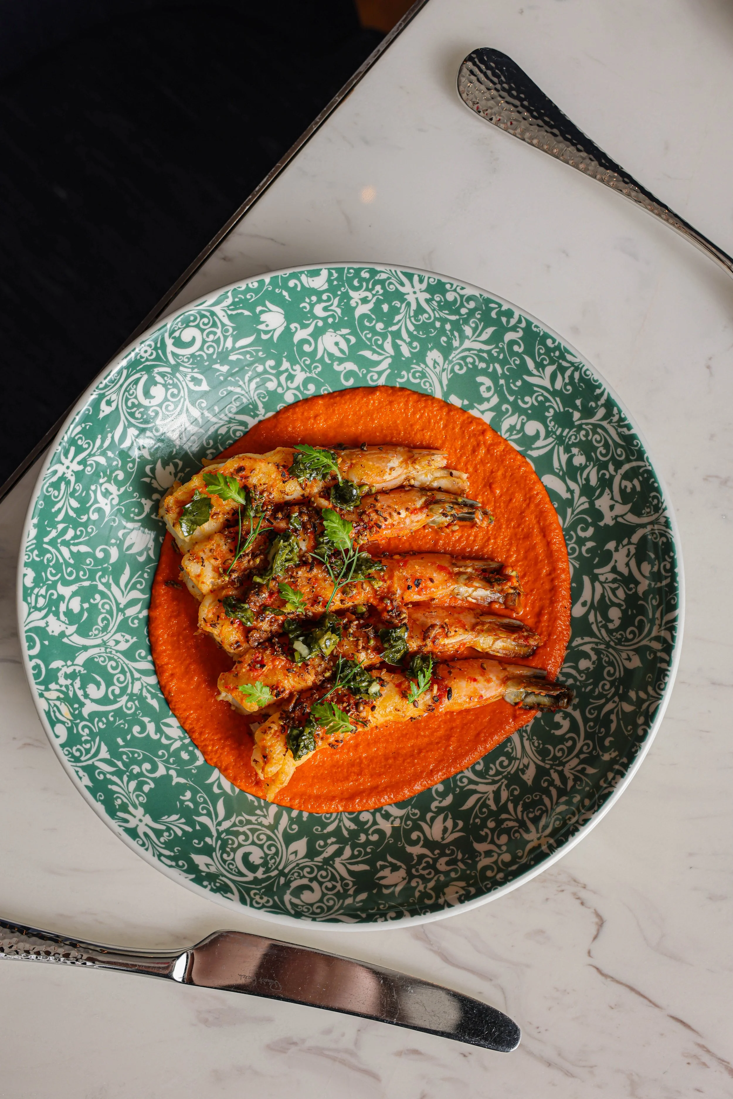 Chef Andrew Rodriguez Conrad Nashville Grilled prawns