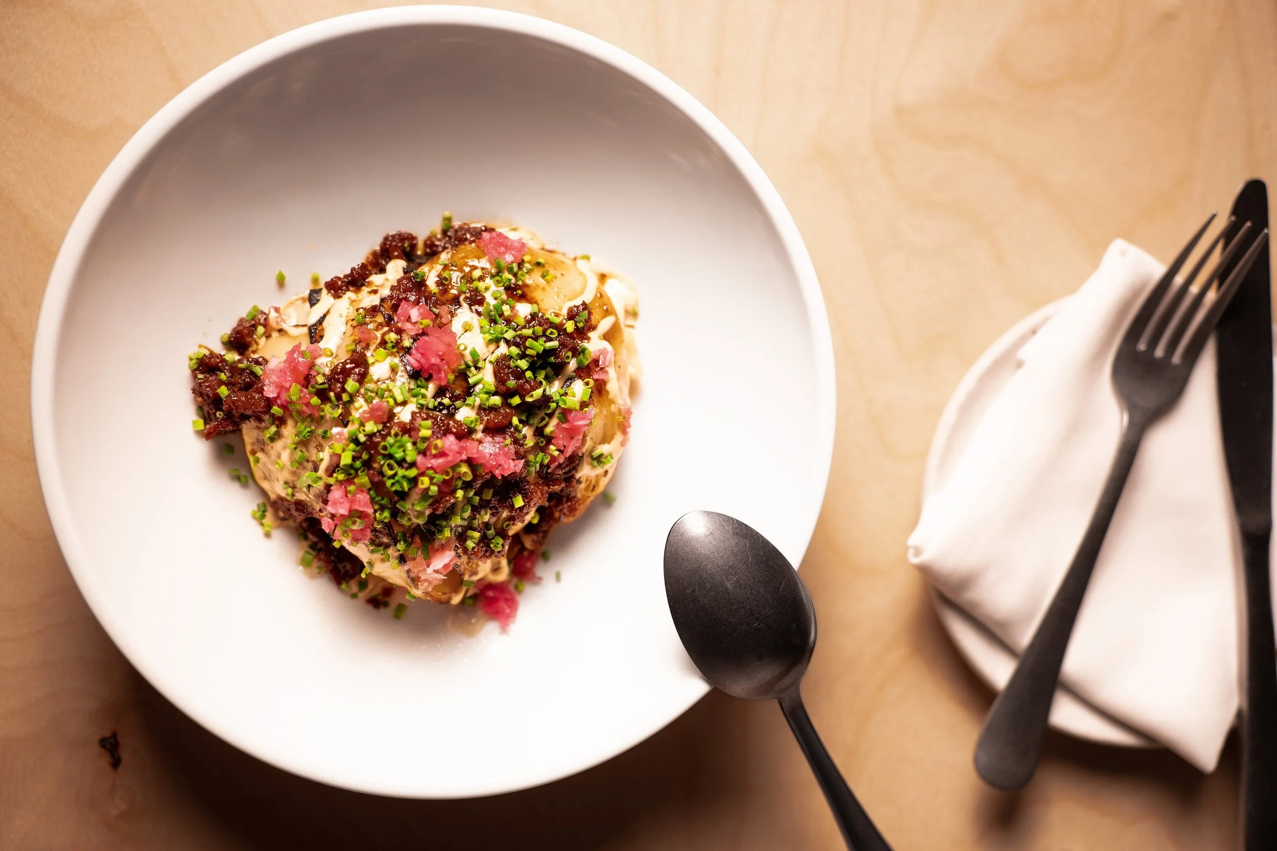 Sai Batta Wildling Restaurant Kelowna British Columbia Charred cabbage prosciutto
