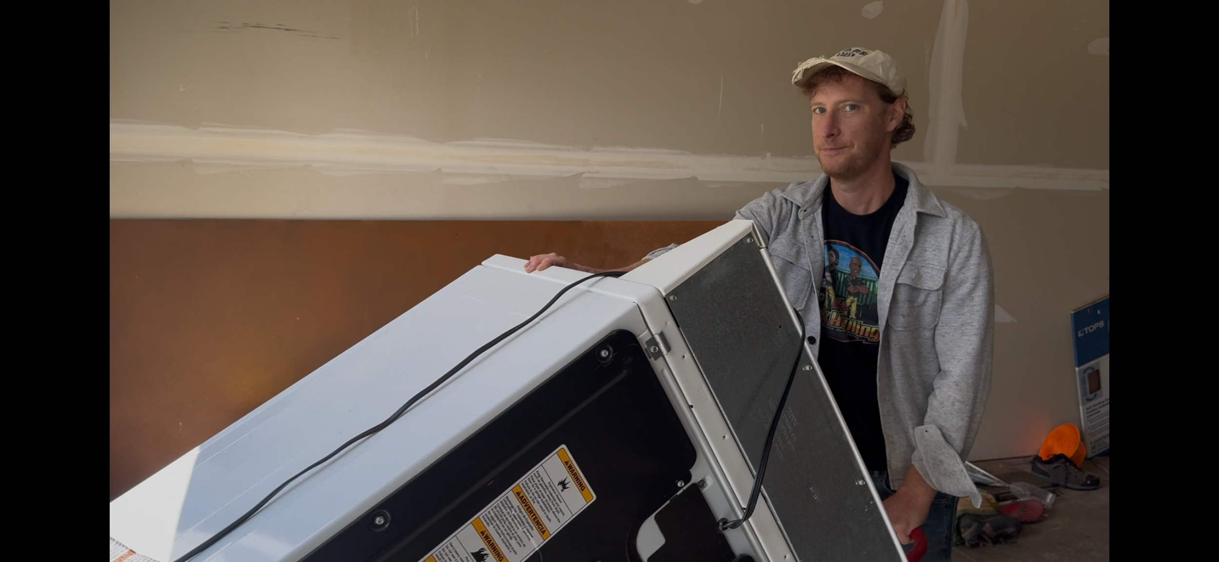 Nate, The owner of A+ Junk Hauling providing junk removal service