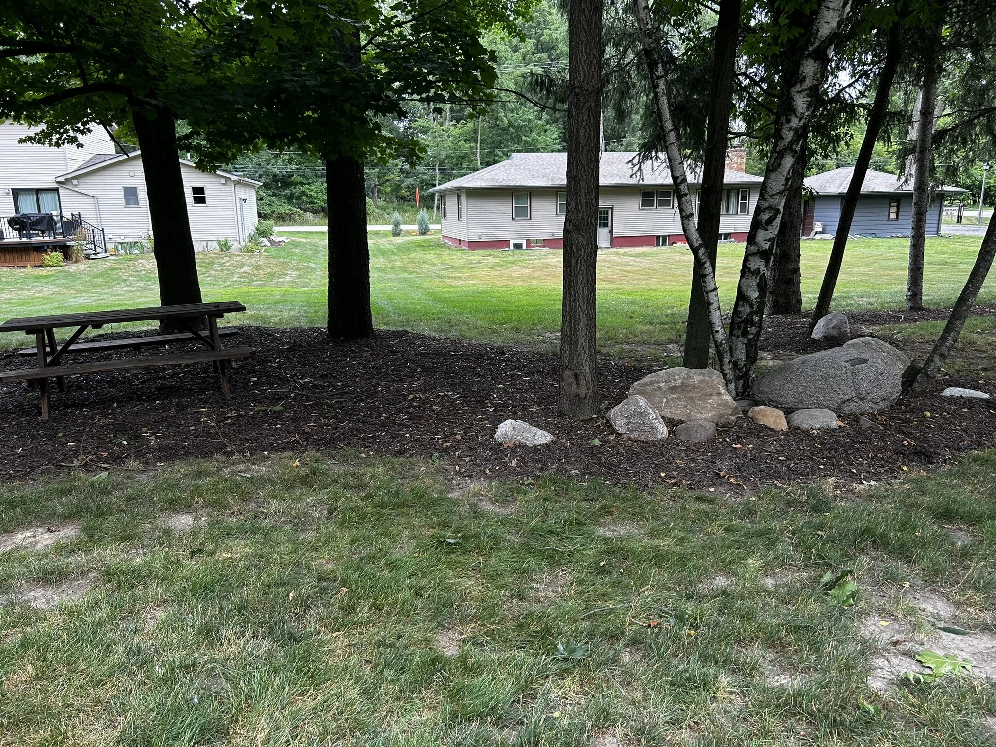 A residential yard after green waste removal