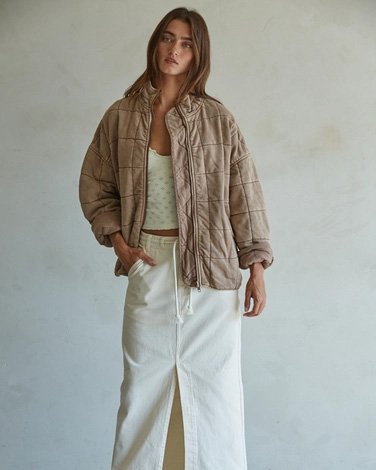 Woman wearing a rose taupe By Together Long Sleeve Quilted Knit Mineral Washed Jacket
