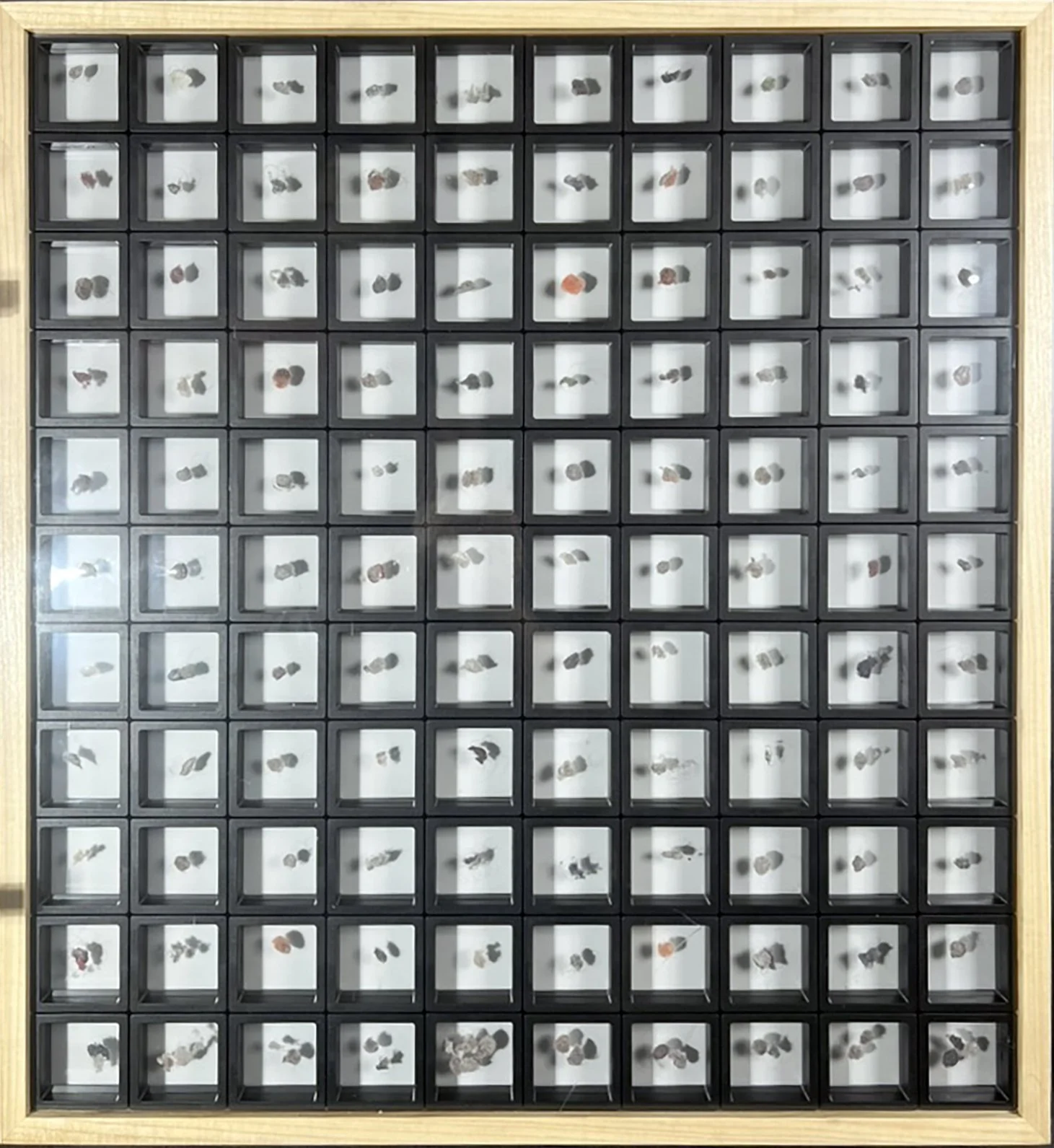 Salstrom Objects: After Messier and his Objects (2025).
110 collected belly button lints displayed in a manner similar to Charles Messier's catalogue of astronomical objects he discovered.