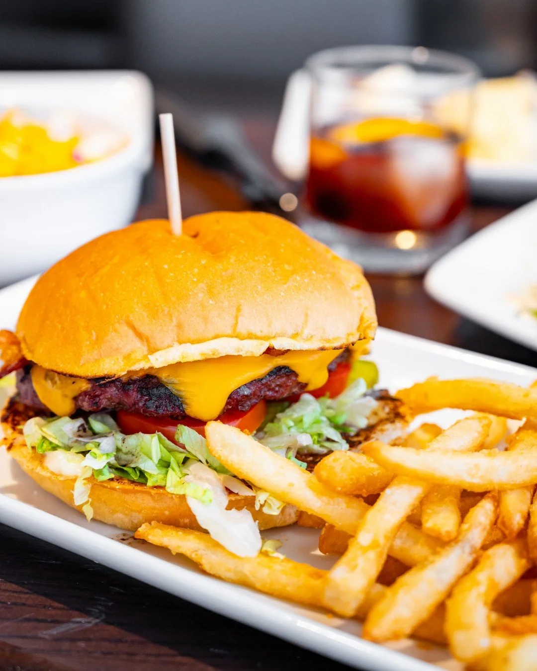 Beer in one hand, All American Burger in the other. 🍺🍔 That&rsquo;s how you win the night. 🔥