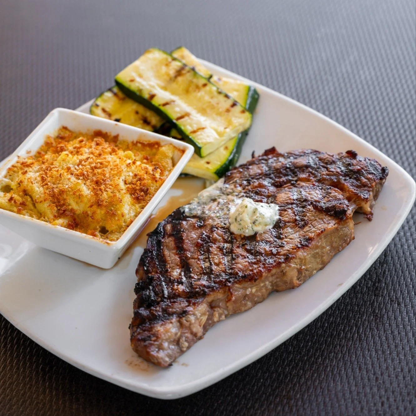 Celebrate National Steak Day the right way. Juicy, bold, and wood-fired for maximum flavor. Reserve your table today and treat yourself to a steak worth talking about.