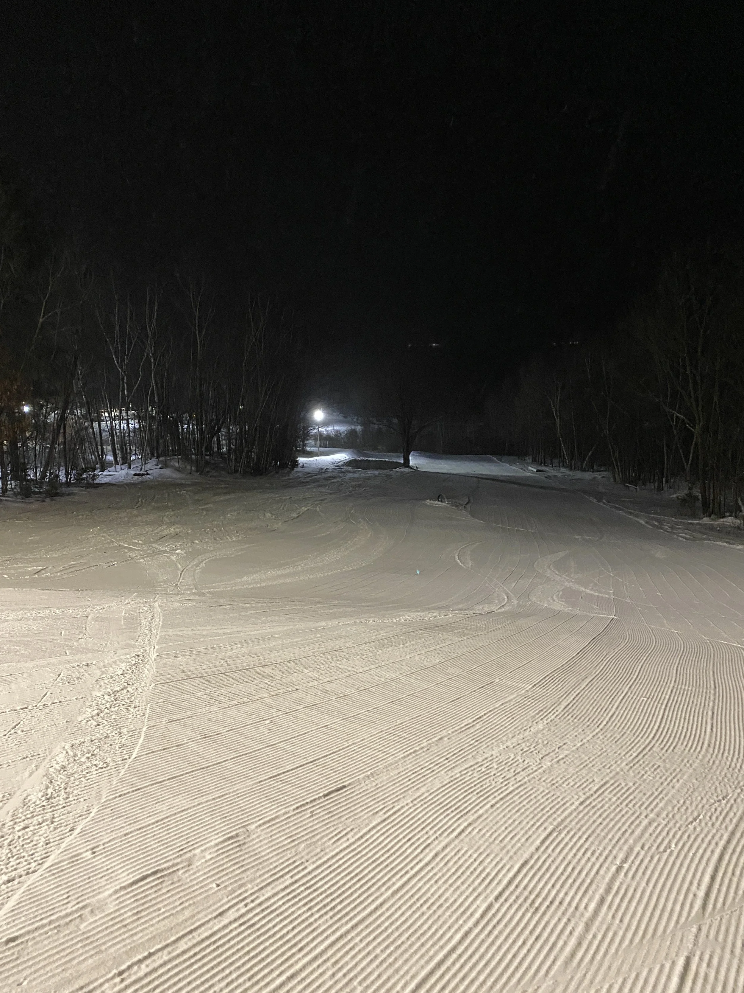 SKIING UNDER THE LIGHTS ON A FRIDAY NIGHT IN NEW YORK