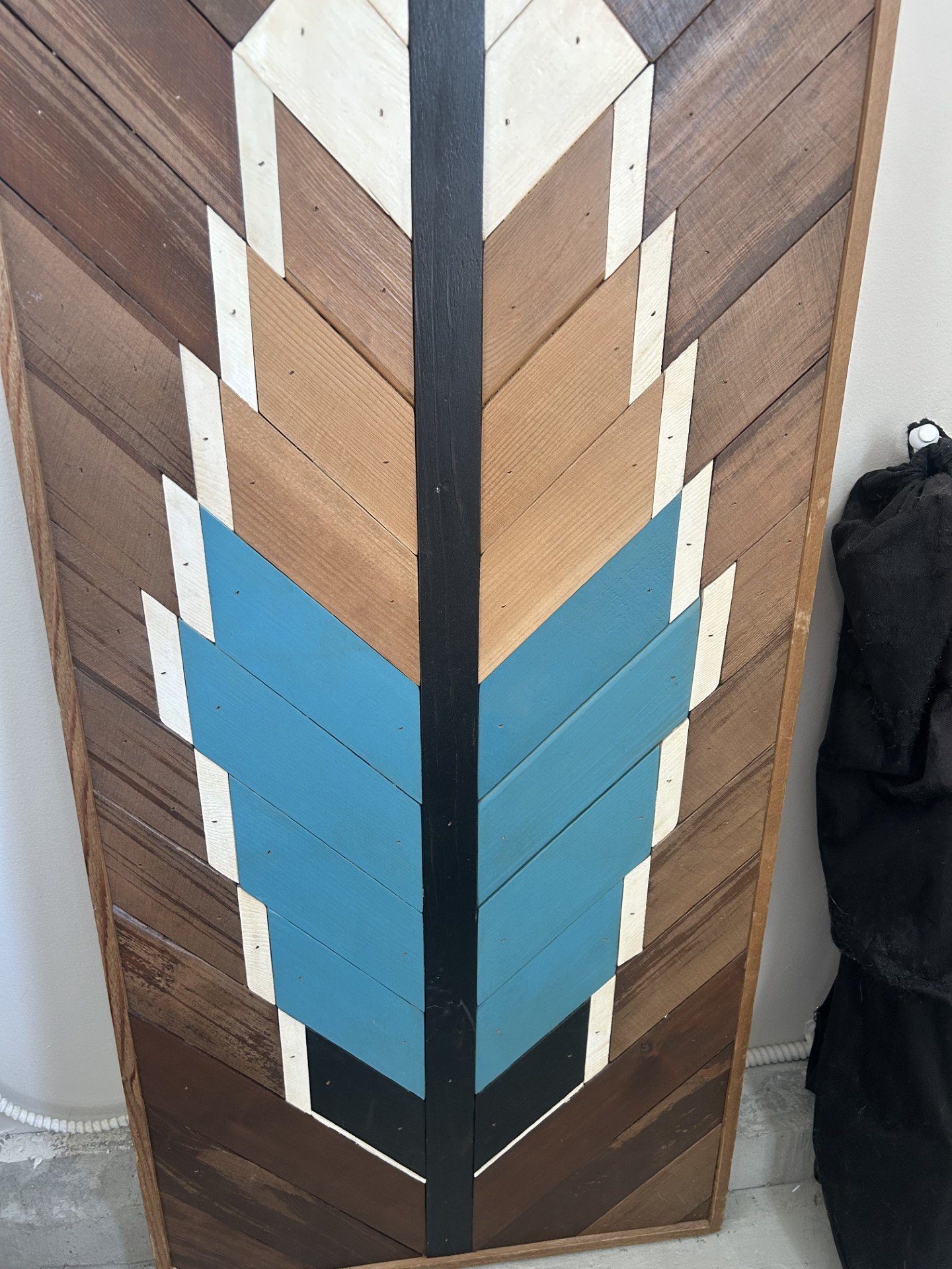 Handmade reclaimed-wood chevron art