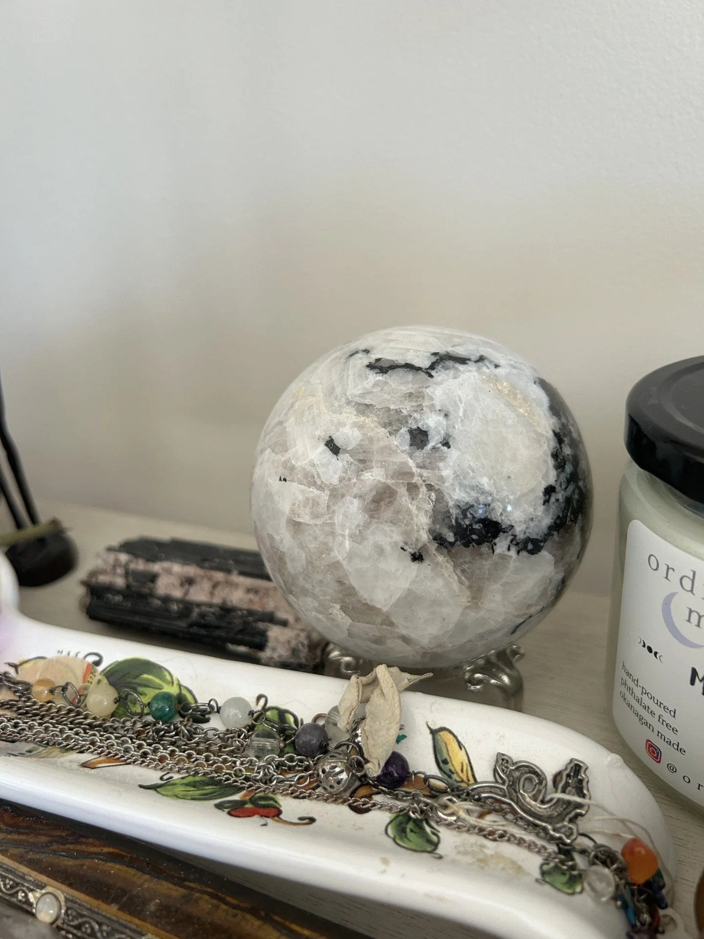 Rainbow moonstone sphere with black tourmaline