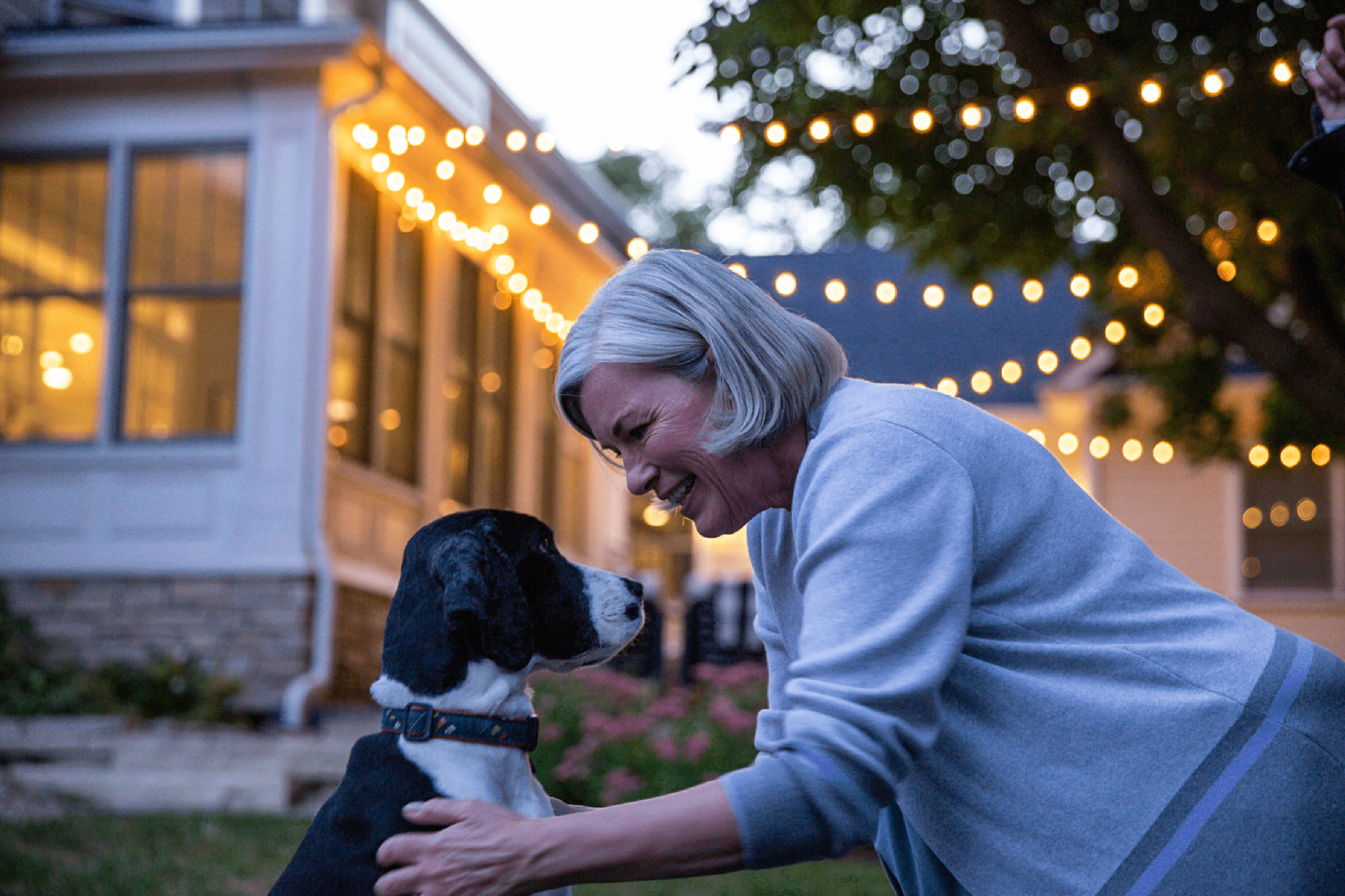 work_lifestyle-woman-in-backyard-with-dog-1.png