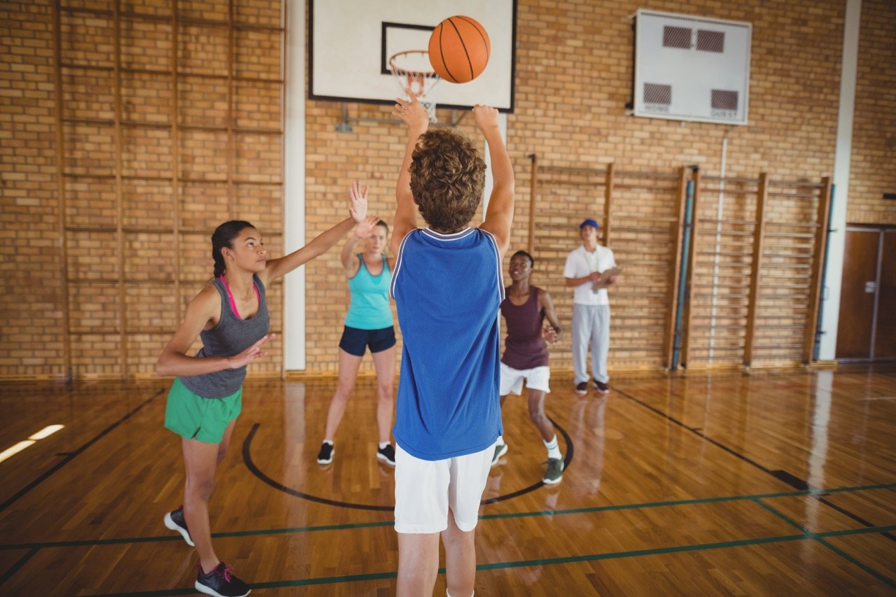 determined-high-school-kids-playing-basketball-2025-04-04-18-41-16-utc Large.jpeg