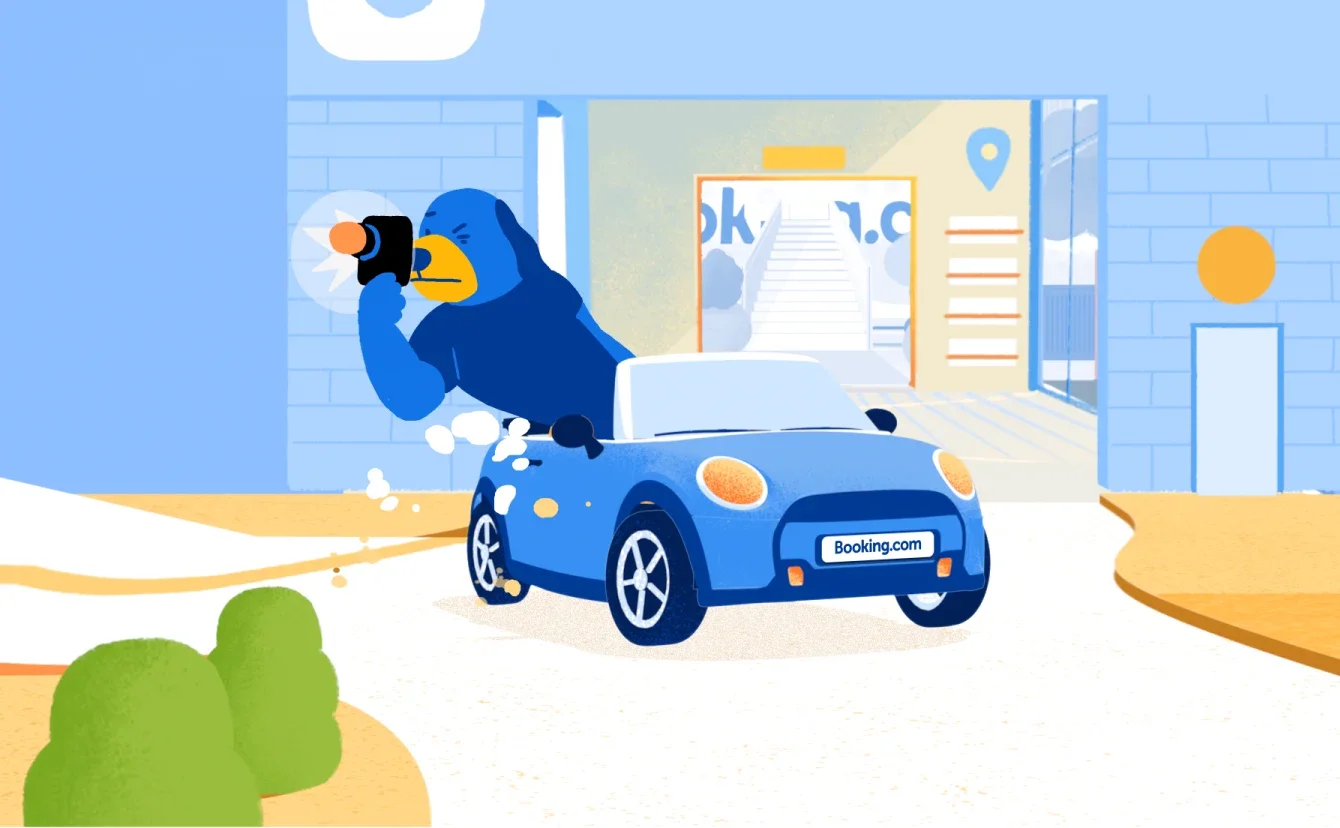 Animated illustration of a blue car with a Booking.com license plate parked outside a building. A yellow bird with a blue body is holding a walkie-talkie, talking into it, with a snowball hitting its face.