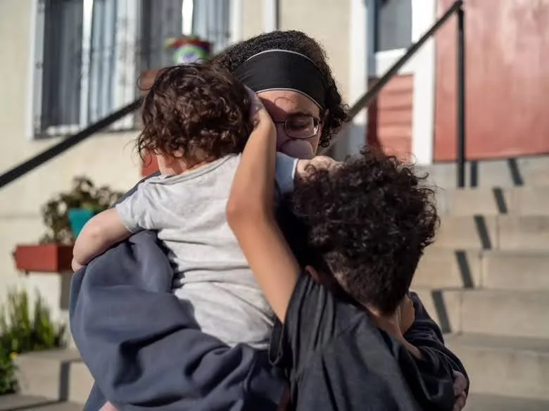 mom and two kids.jpeg