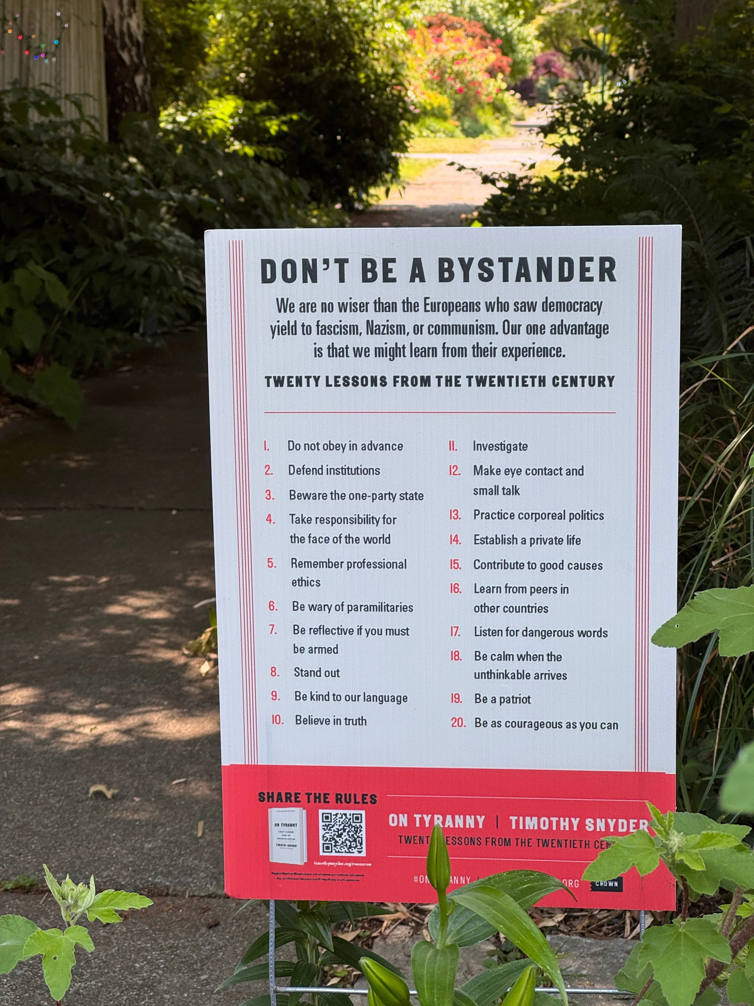 sidewalk bystander sign.jpeg