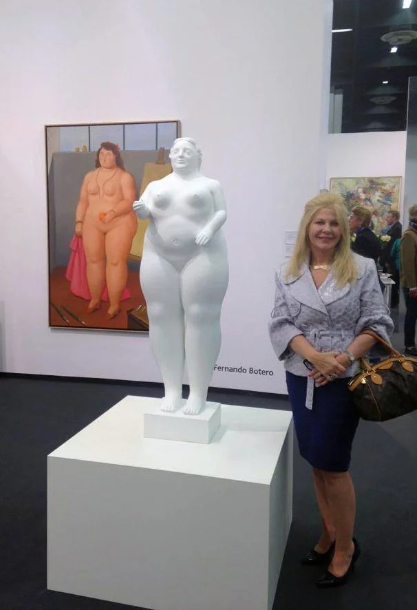 Art Advisor Ruth Crnkovich with Fernando Botero white sculpture at Art Cologne in Germany.