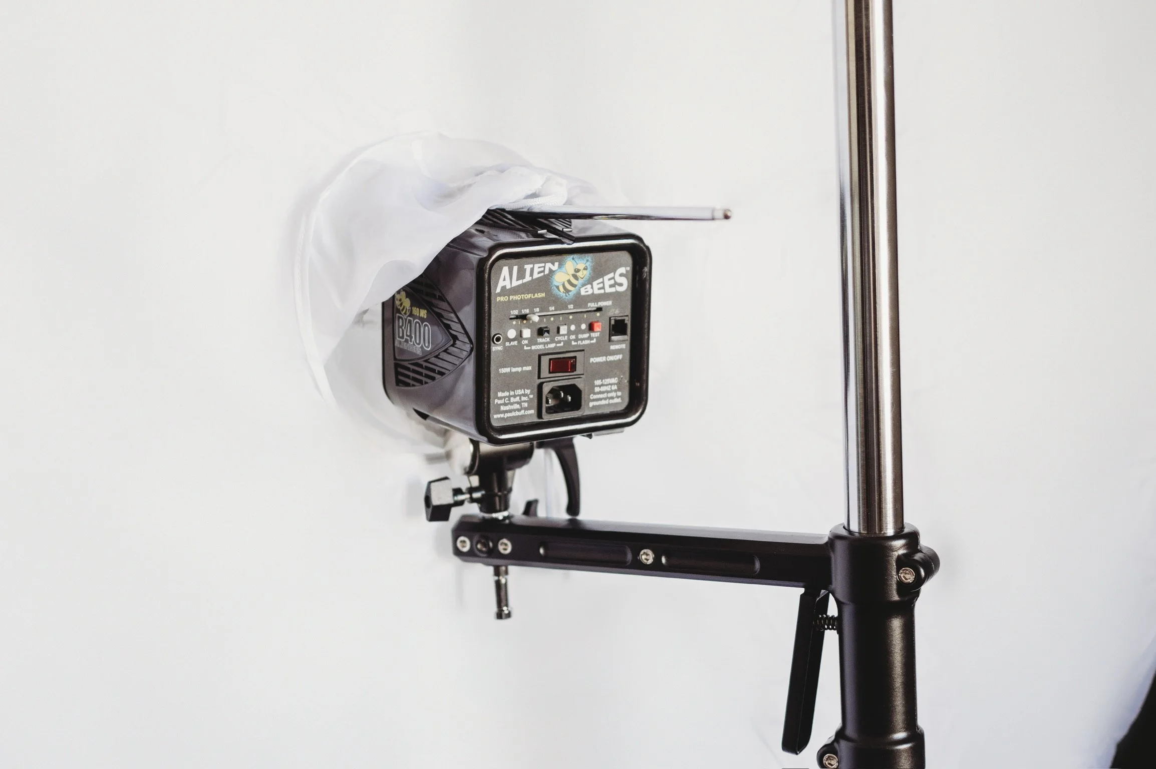 Professional softbox lighting equipment on a C-stand available for use at our photo studio for rent on the MS Gulf Coast.