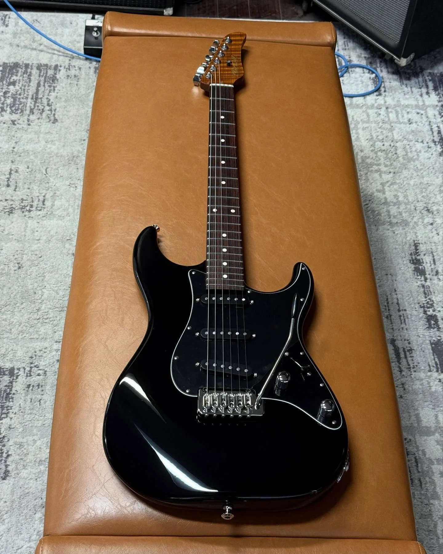 Just finishing up this super sleek Piano Black SX 🖤🖤🎹🎹 Alder Body. Roasted Flamed Maple Neck with an Indian Rosewood Fretboard. Mike Lull Hand-Wound 57s. Full C Shape Neck .880-.920. 1 11/16&rdquo; Nut Width. Hipshot Trem and Open-Gear Locking Tu