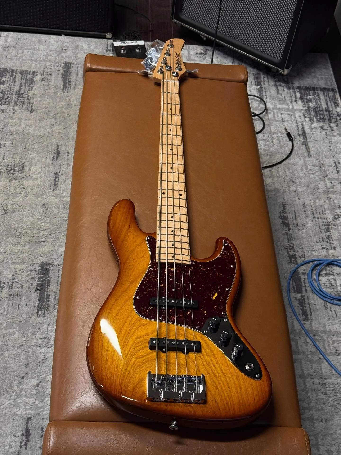 Finishing up a super cool Honey Burst V5 today with a One-Piece, Light Swamp Ash Body, Quartersawn Maple Neck, Birdseye Maple Fretboard, Hand-Wound Mike Lull Pickups, 35&rdquo; Scale and a Hipshot B Bridge.  Just stupendously dope. Weighs in at 8.3 l