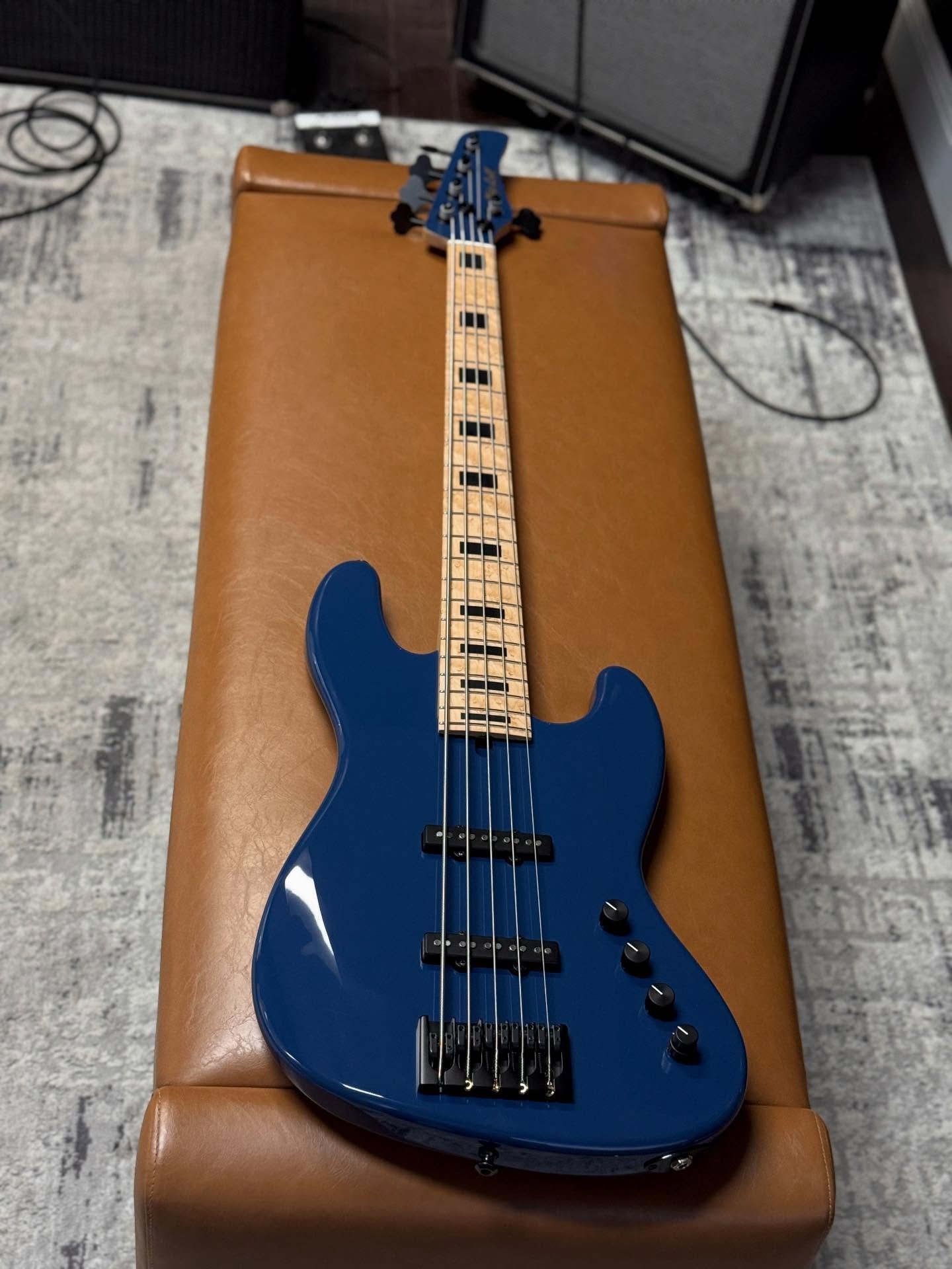 B-STOCK:  Just finishing up this M5V Custom in Porsche Neptune Blue 💙💙💙 Swamp Ash Body (chambered). Birdseye Maple (Black Block Inlays). Mike Lull Hand-Wound Jazz Pickups. @trickfishamps IPA Preamp. 35&rdquo; Scale. This is a rare opportunity to g