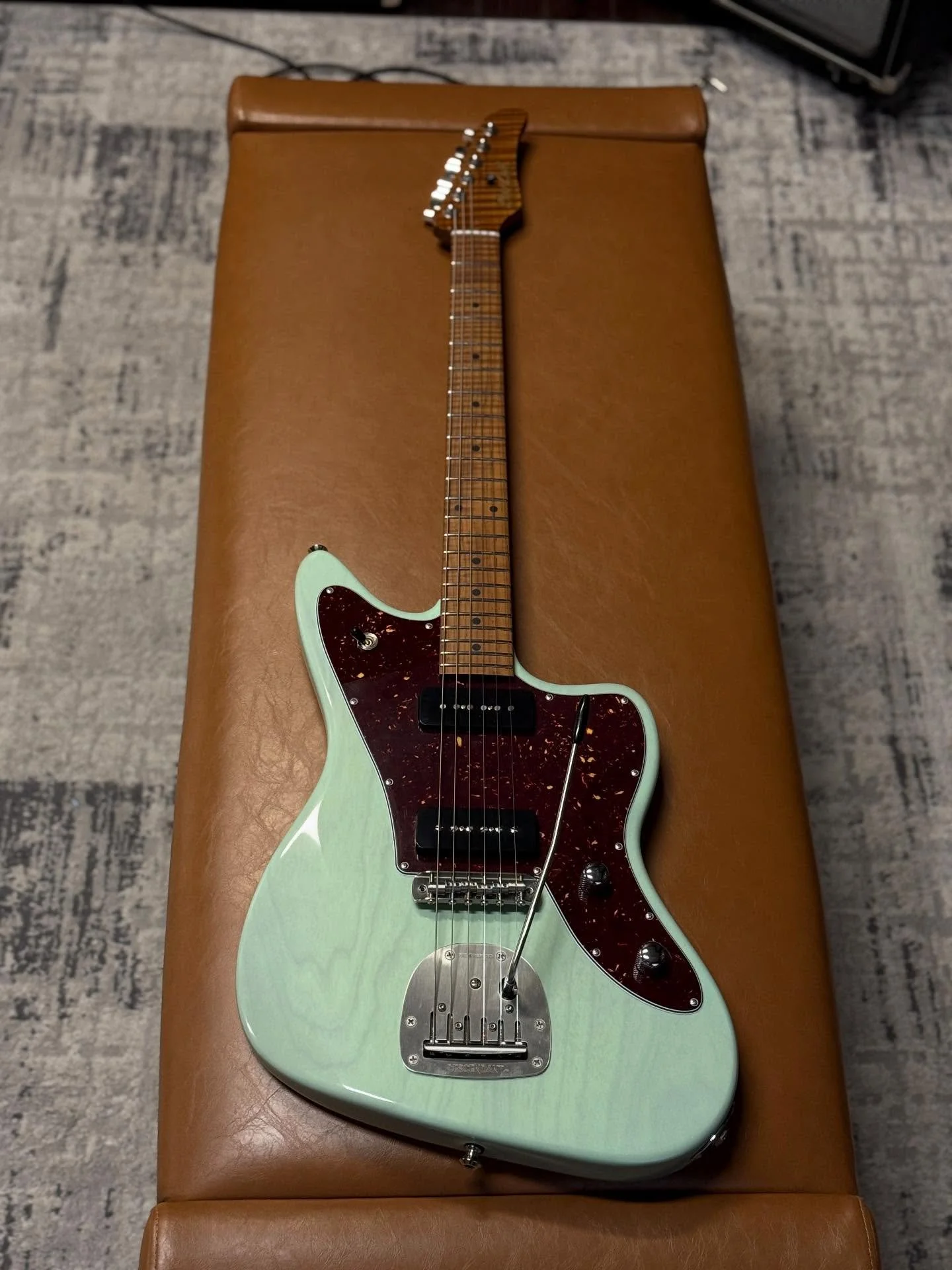 Just finishing up this Translucent Surf Green JX 🏄&zwj;♂️🏄&zwj;♂️🌊🌊💚💚 Swamp Ash Body. Roasted Flamed Maple Neck and Fretboard.  Medium C Shape Neck (.830-.890). Mike Lull Hybrid P90s. @descendantvibrato Bridge and Vibrato. Beauty 🔥🔥

(Availab