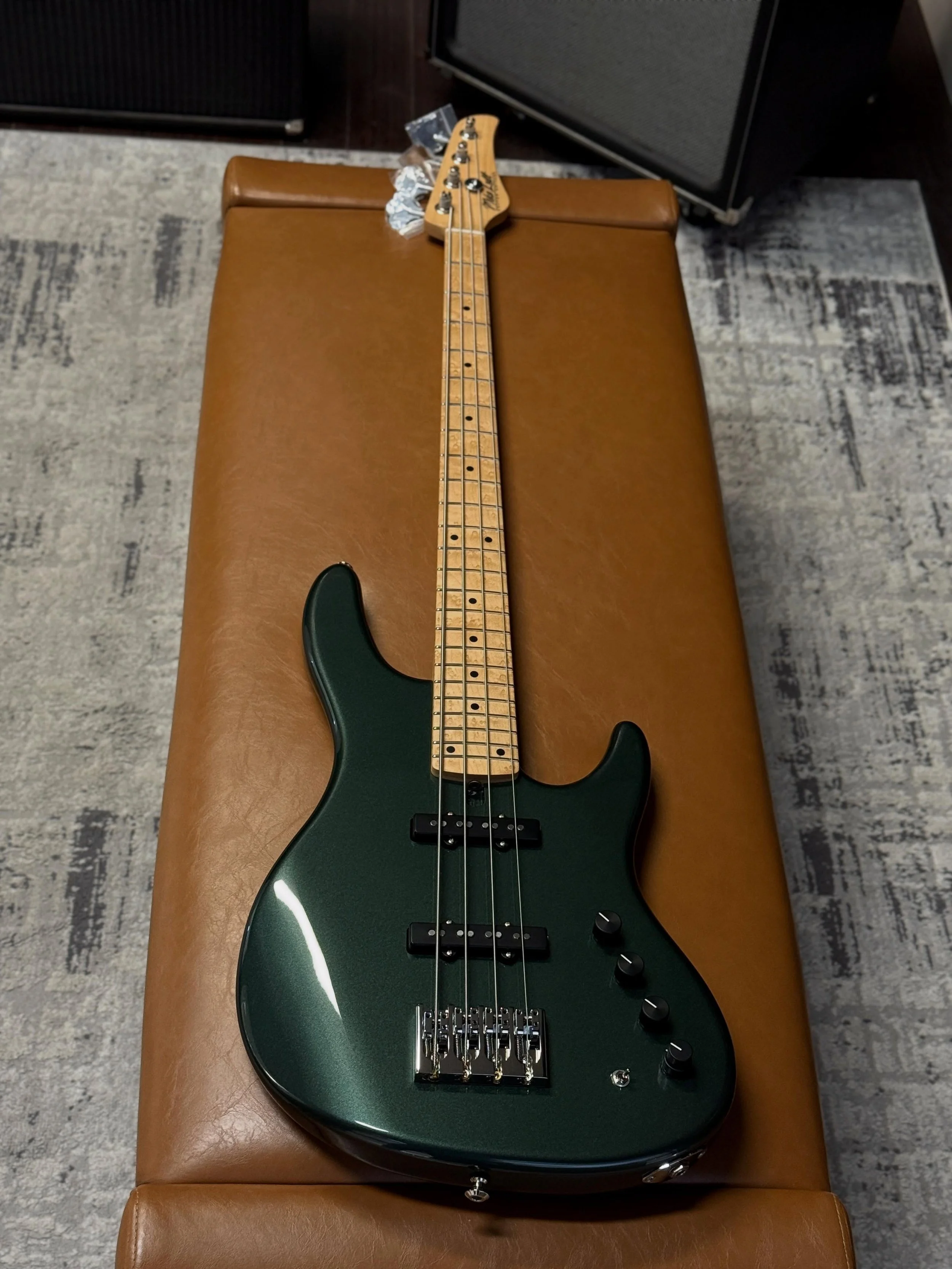 Just finishing up this M4 Custom in Firemist Charcoal 🖤💚🔥 Swamp Ash Body. Premium Birdseye Maple Fretboard. Mike Lull Hand-Wound Jazz Pickups with Series/Parallel Switching. Trickfish IPA preamp. 8.0 lbs. STUNNER. 

(Available Soon)