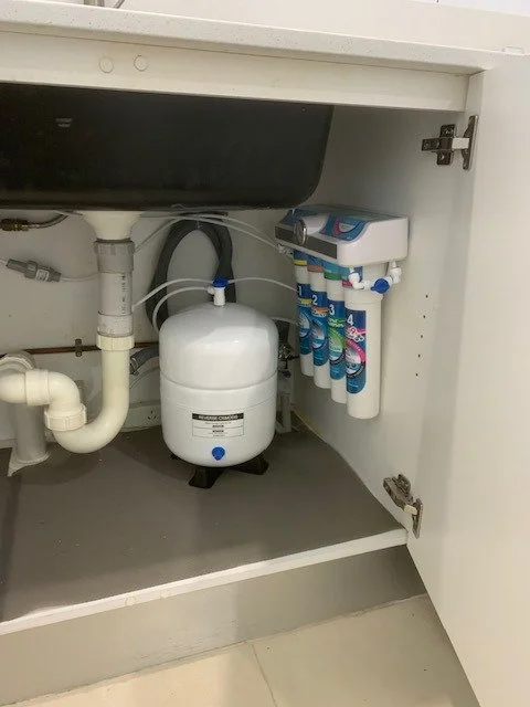 Under sink water filter system with multiple filter cartridges installed. Supplied & Installed MNC Water Filters in Port Macquarie