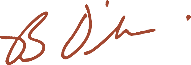 Close-up of a handwritten note in brown ink.