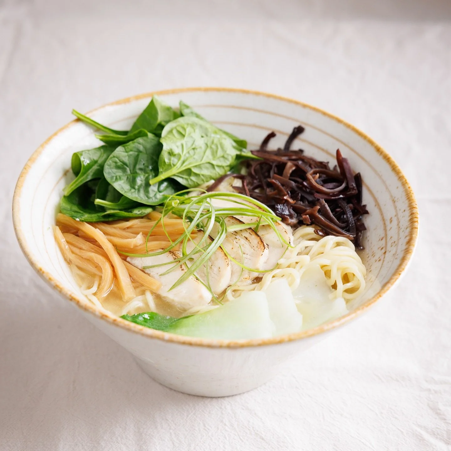 Slurping our way through Long Beach! 🍜✨
Our Shio (Salt) Chicken Ramen&mdash;a clean, soul-warming bowl topped with tender chicken, spinach, woodear mushrooms, and bamboo shoots. 

🍜 Craft Ramen &amp; Hibachi Fried Rice
📍 4211 E Willow St, Long Bea