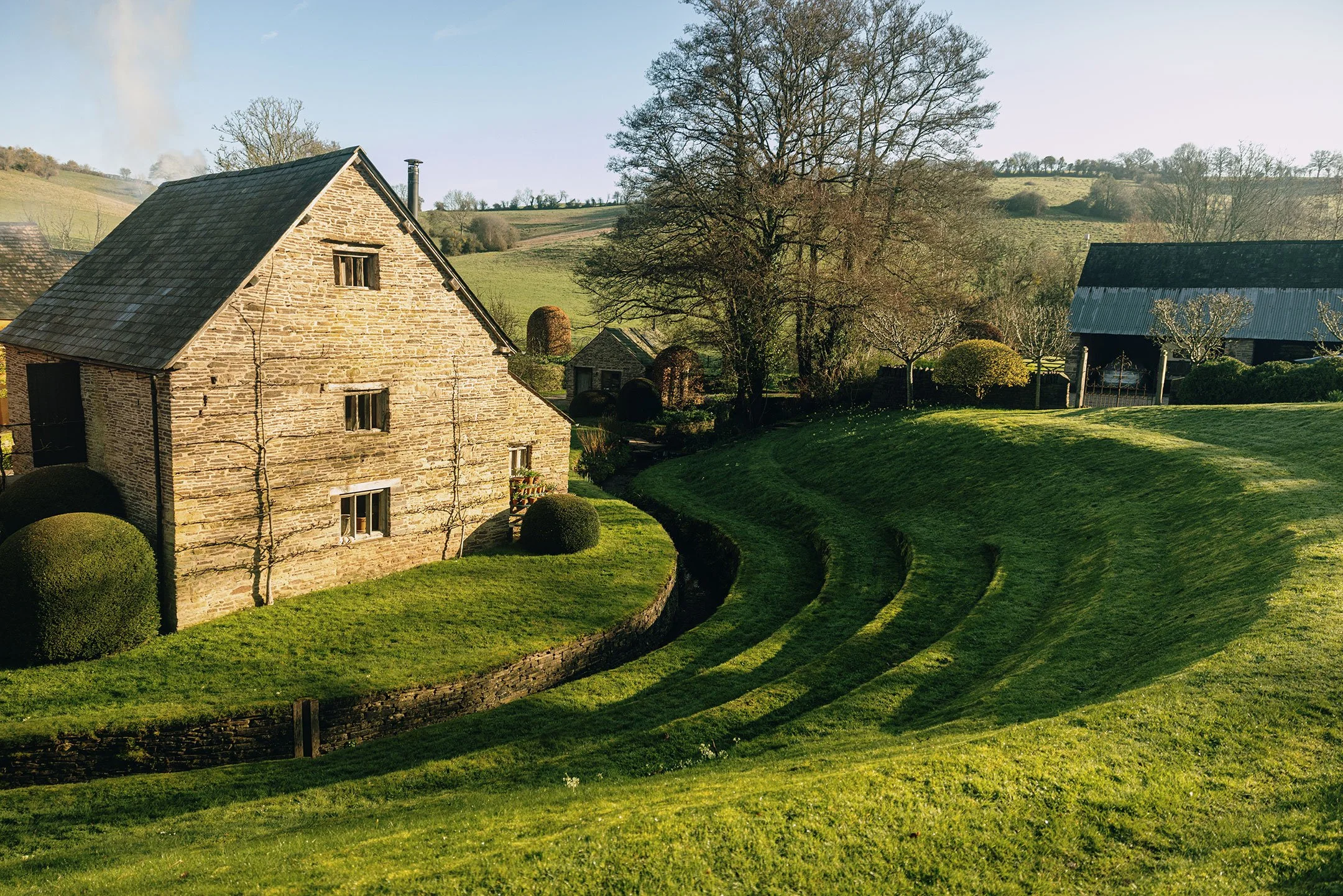 Large garden amphitheatre and lawn care