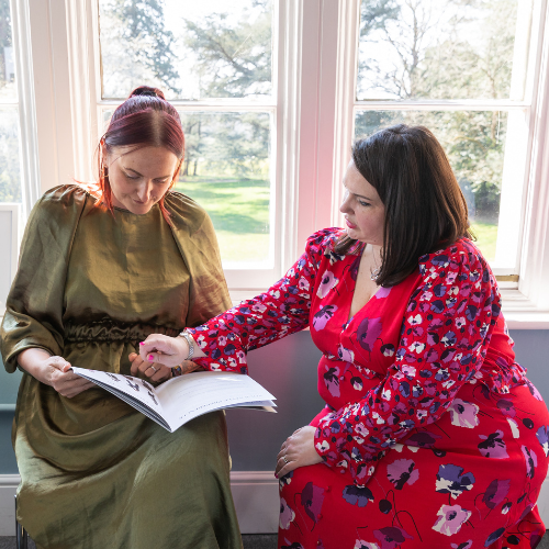 Geometric drawing of an outline square with sections divided by vertical, horizontal, and circle lines.