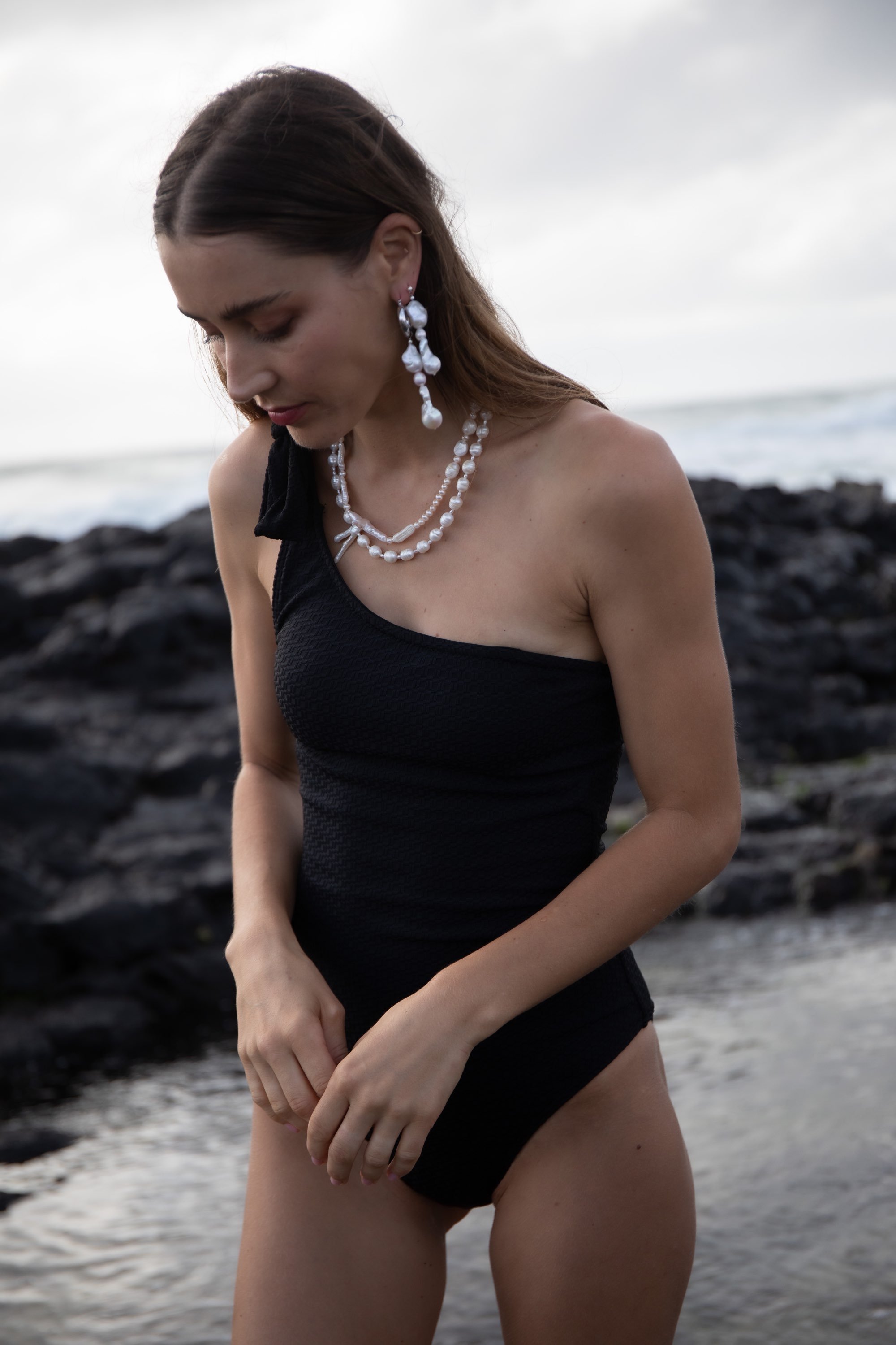 Model wearing Pearl Divers Wife Stud Earrings designed and created by Baby Blue Jewellery Byron Bay
