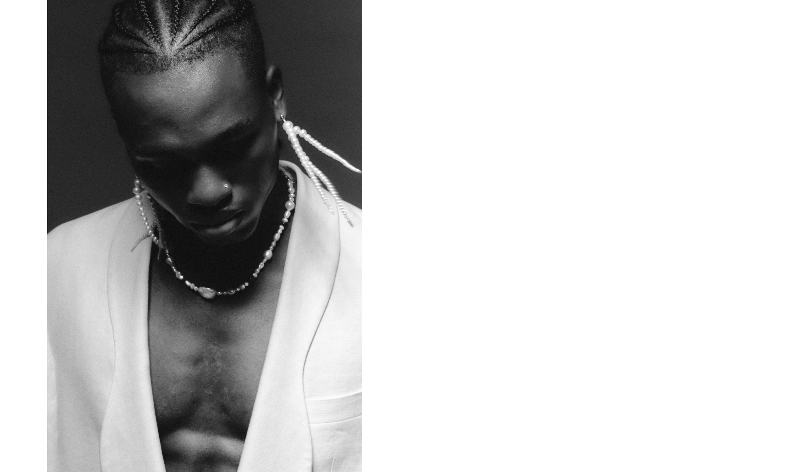 VICTOR WEARS THE DANCE OF THE OCTOPUS EARRINGS AND ELSEWHERE NECKLACE