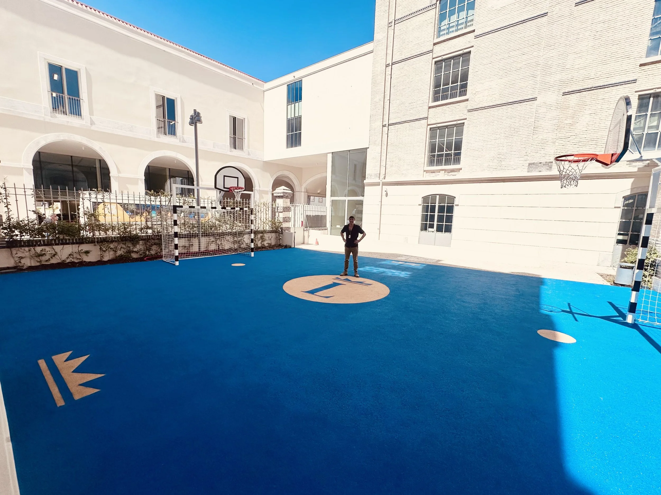 .. and after. A multi sports area with recycled protective rubber floor, as part of the collaborative scheme.