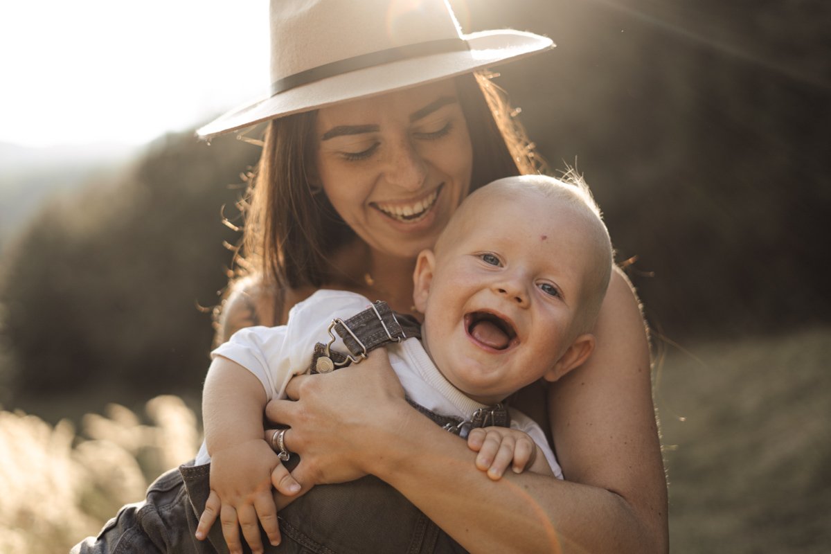 Family portrait with sunset mummy and baby in Brighton and Hove East Sussex
