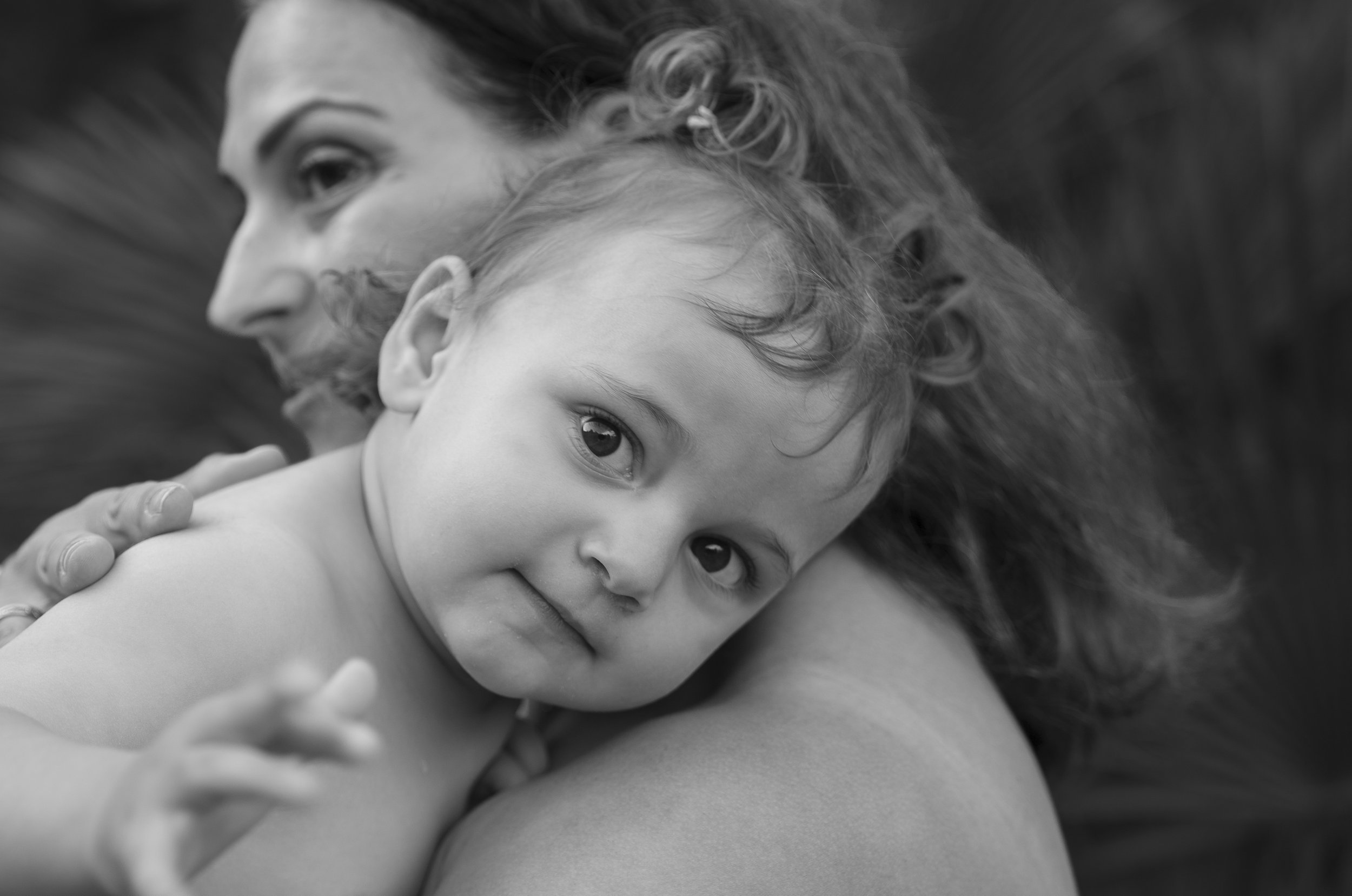 Black and white family portrait, intimate mother and baby in Brighton and Hove, East Sussex