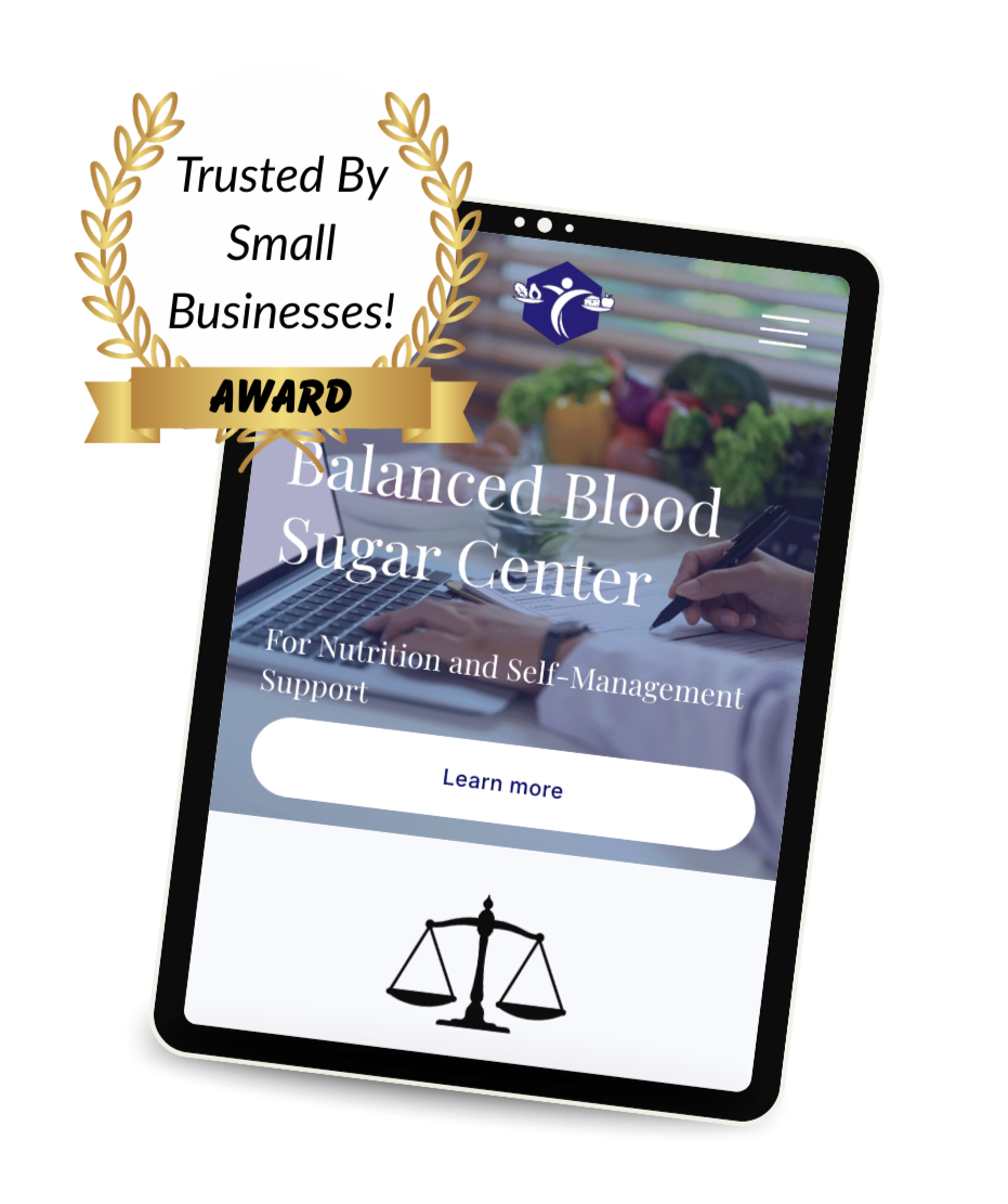 Close-up of a tablet displaying the Balanced Blood Sugar Center website, with a background of fresh vegetables and a person writing. A badge in the top left corner reads "Trusted By Small Businesses!" with a gold laurel and a "Award" ribbon.