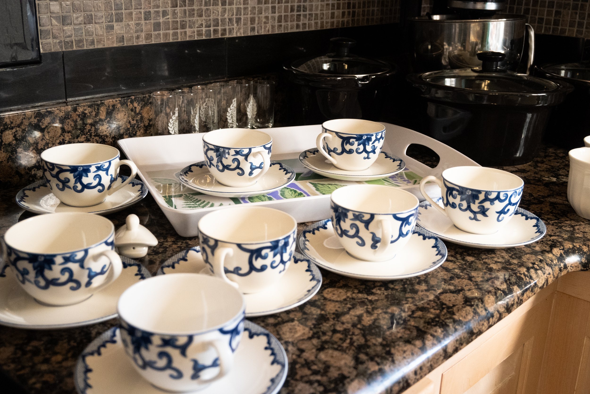 Photo of beautiful, ornamentally painted tea cups.