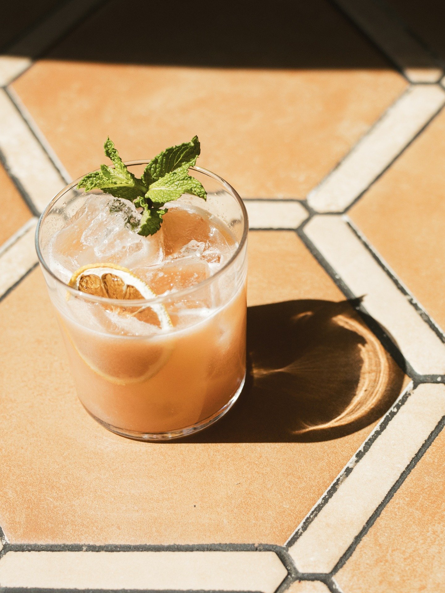 The sun is shining and happy hour is calling your name at N&oacute;mada.