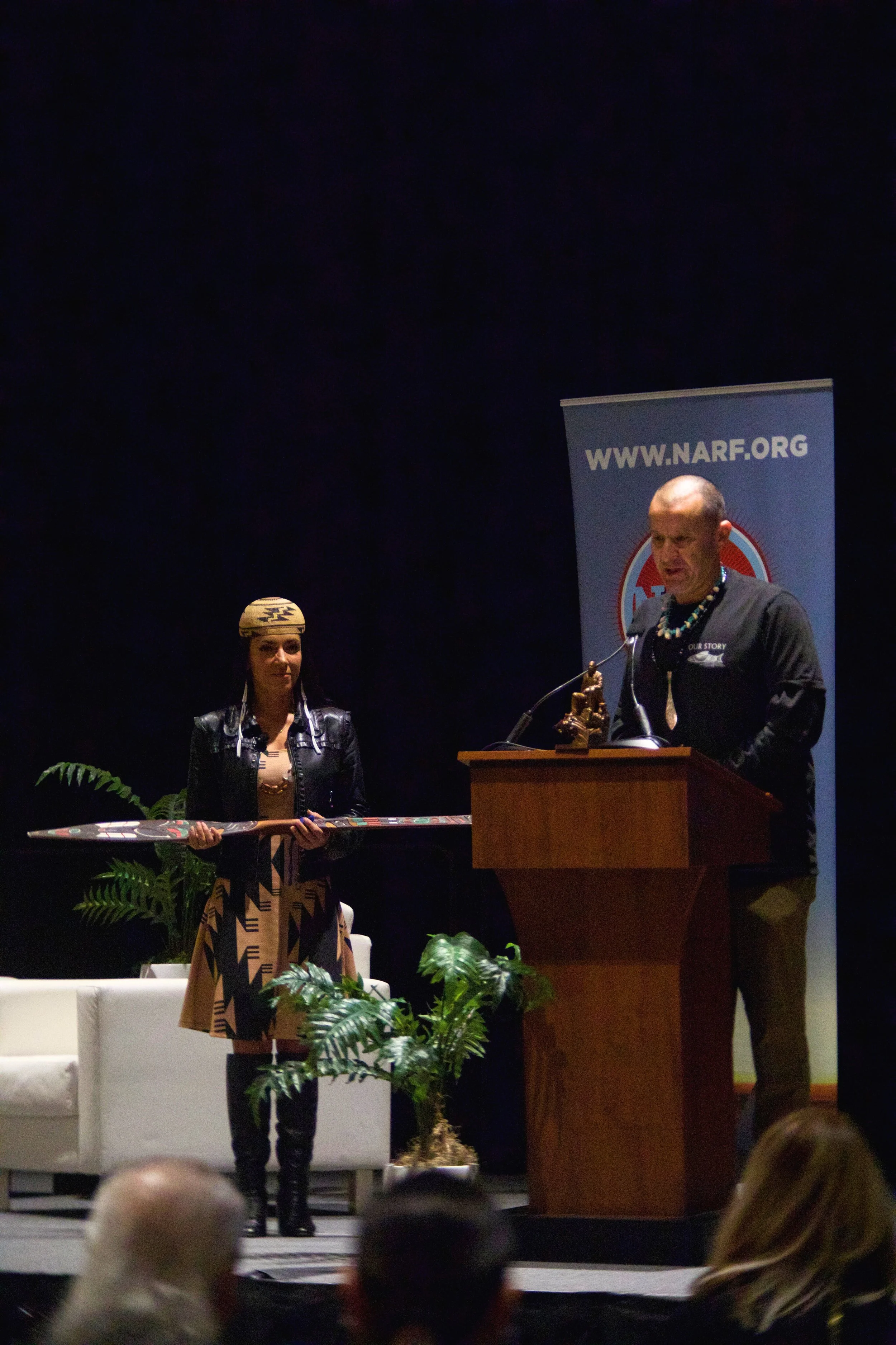 Willie Frank III introducing Amy Bowers Cordalis at NCAI's 82nd Annual Convention. 