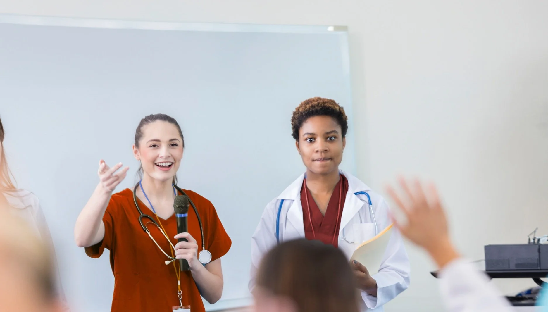 two healthcare providers do a speech