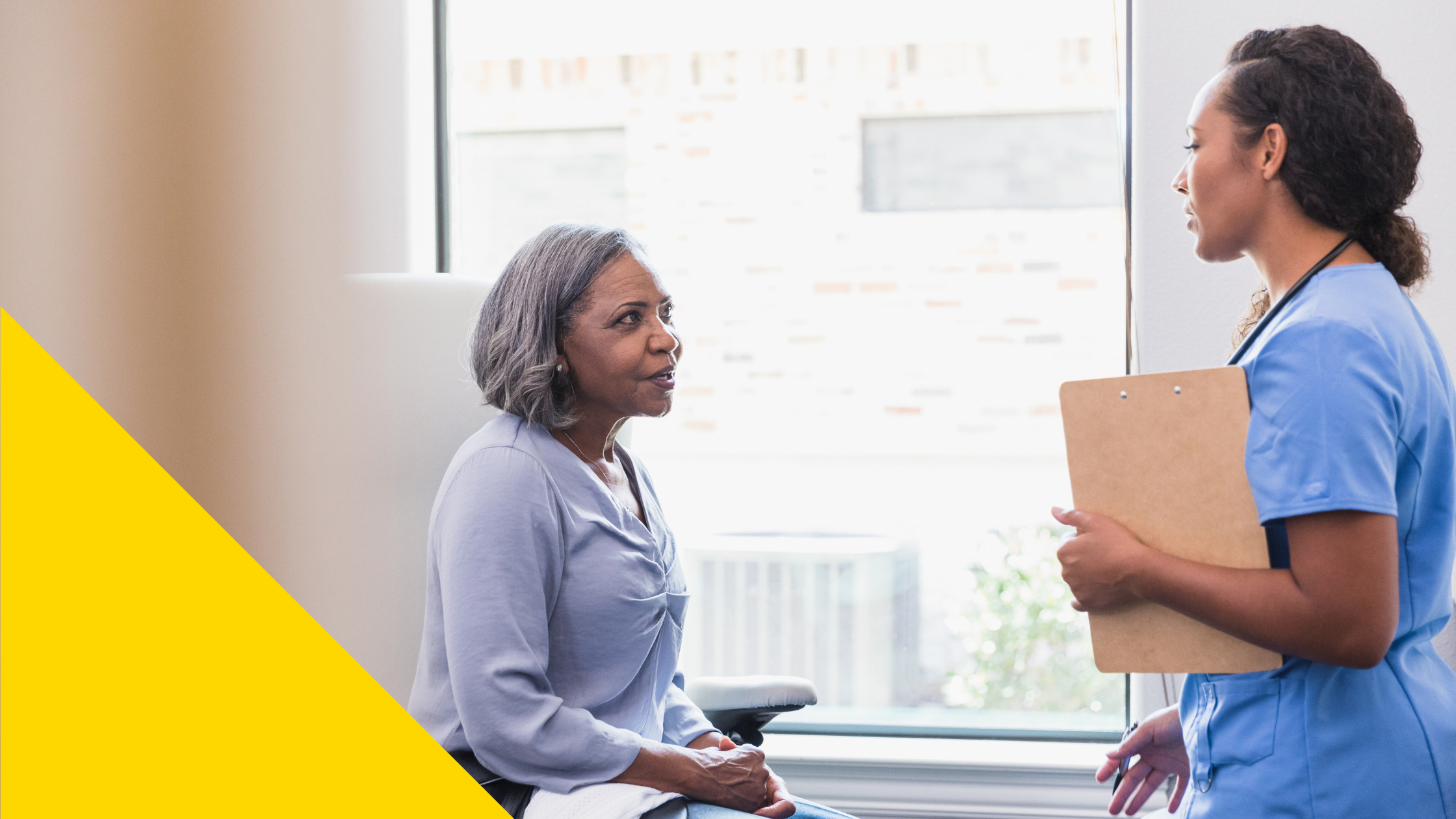a healthcare provider speaks with a patient
