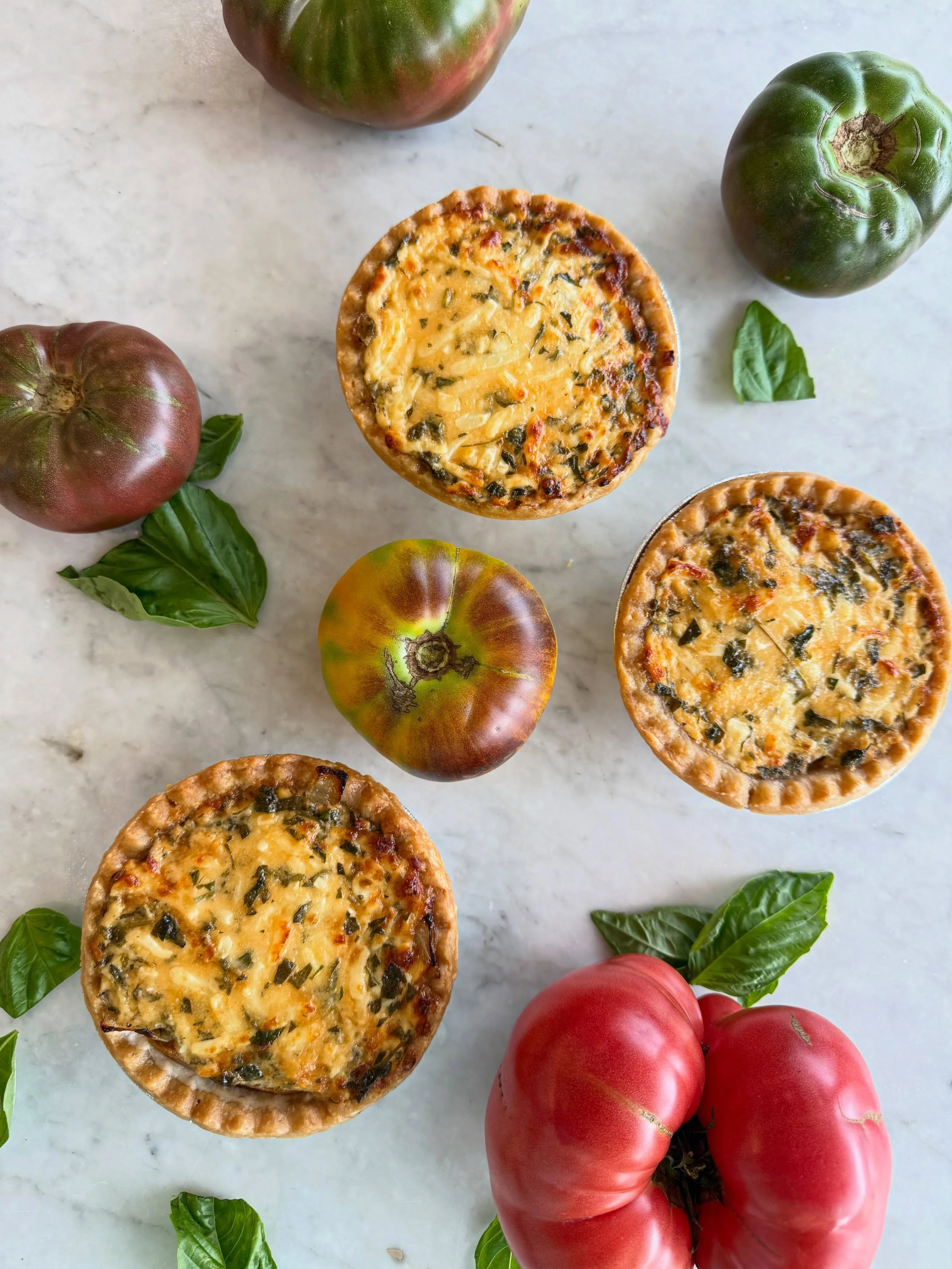 🍅‼️ Sound the alarms, local tomatoes have arrived ‼️🍅

Our friends at @halleluyahgardens sent us the most gorgeous heirloom tomatoes this week. It&rsquo;s a sign that summer is here and also means the return of cult favorite: tomato pie.

Y&rsquo;a